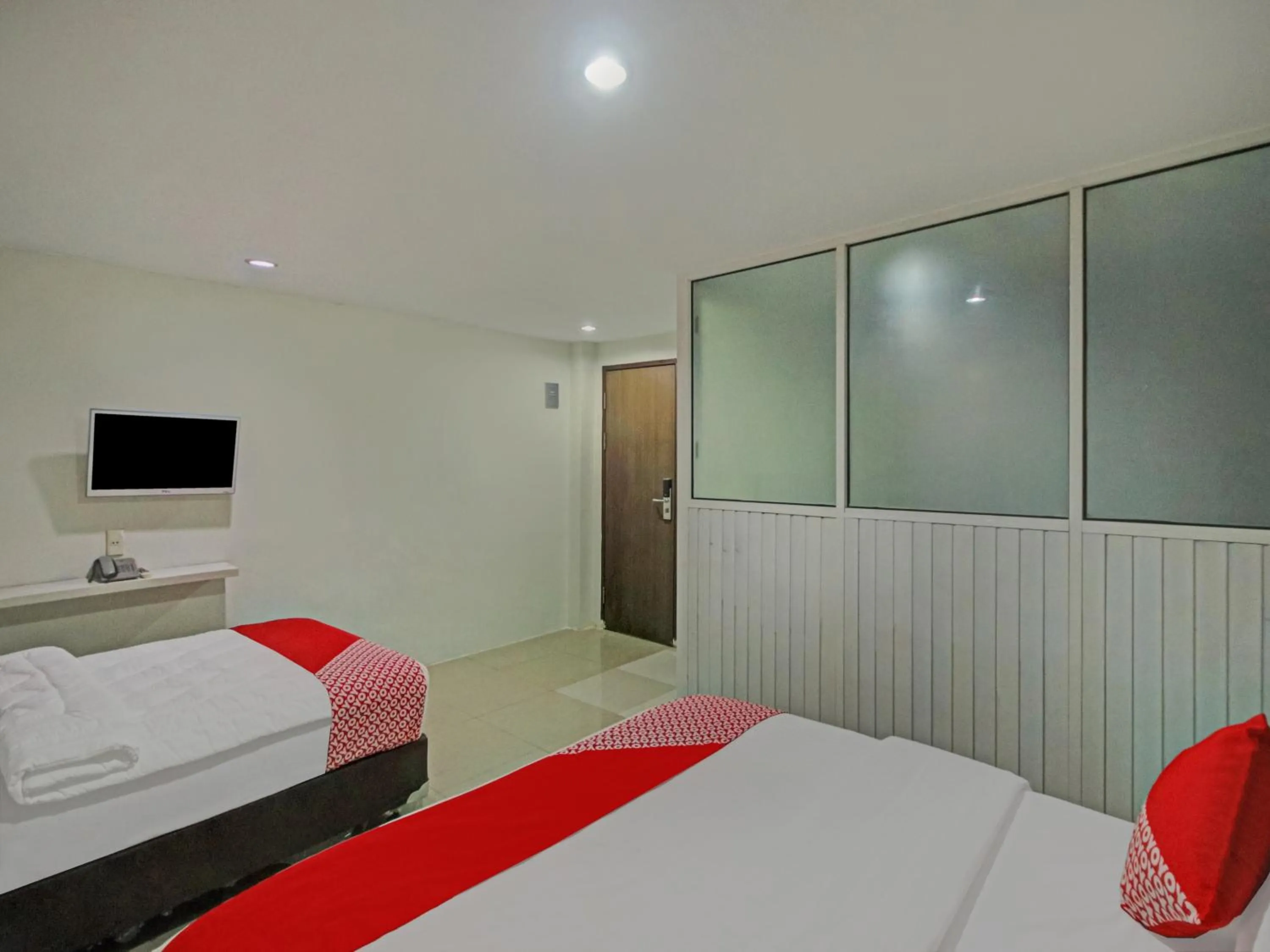 Bedroom in OYO 2574 Z Suites Hotel