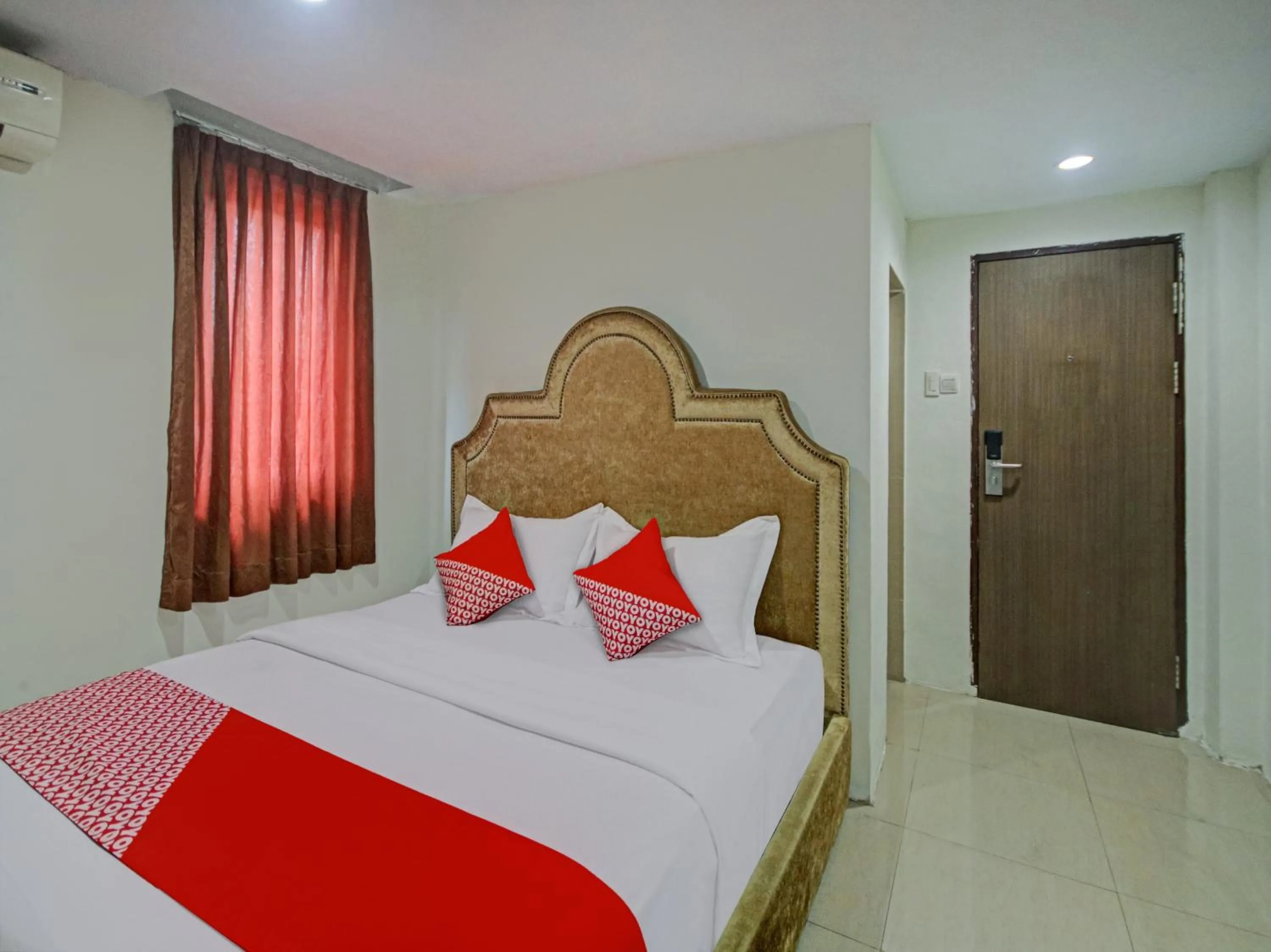 Bedroom in OYO 2574 Z Suites Hotel