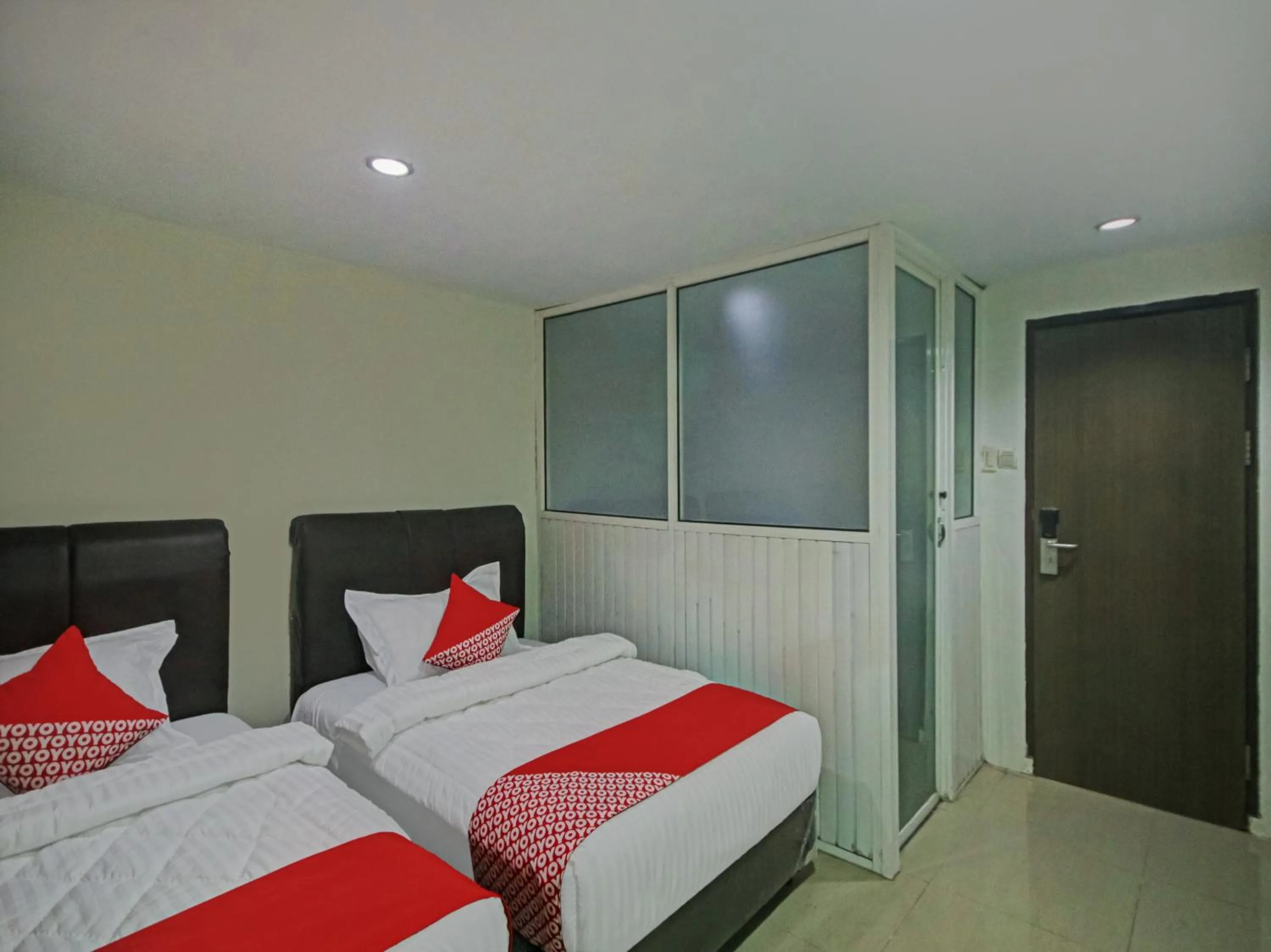 Bedroom in OYO 2574 Z Suites Hotel