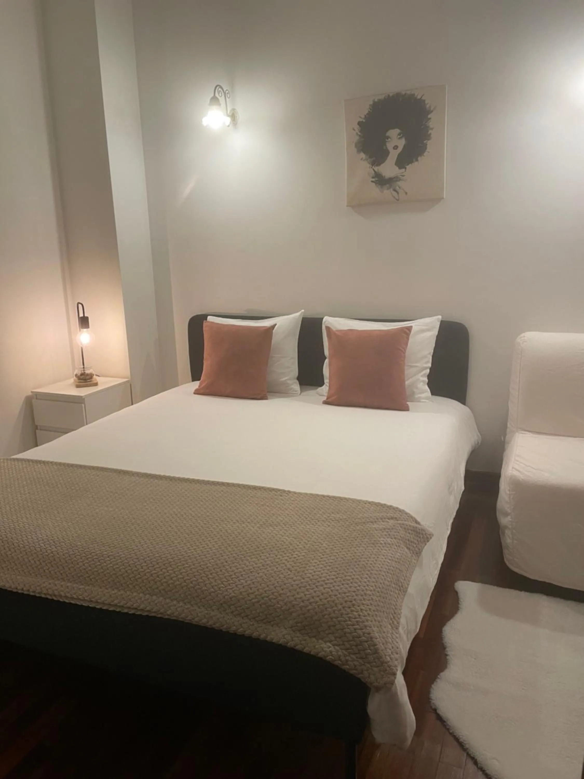 Bed in Miguel Bombarda Cozy Apartment