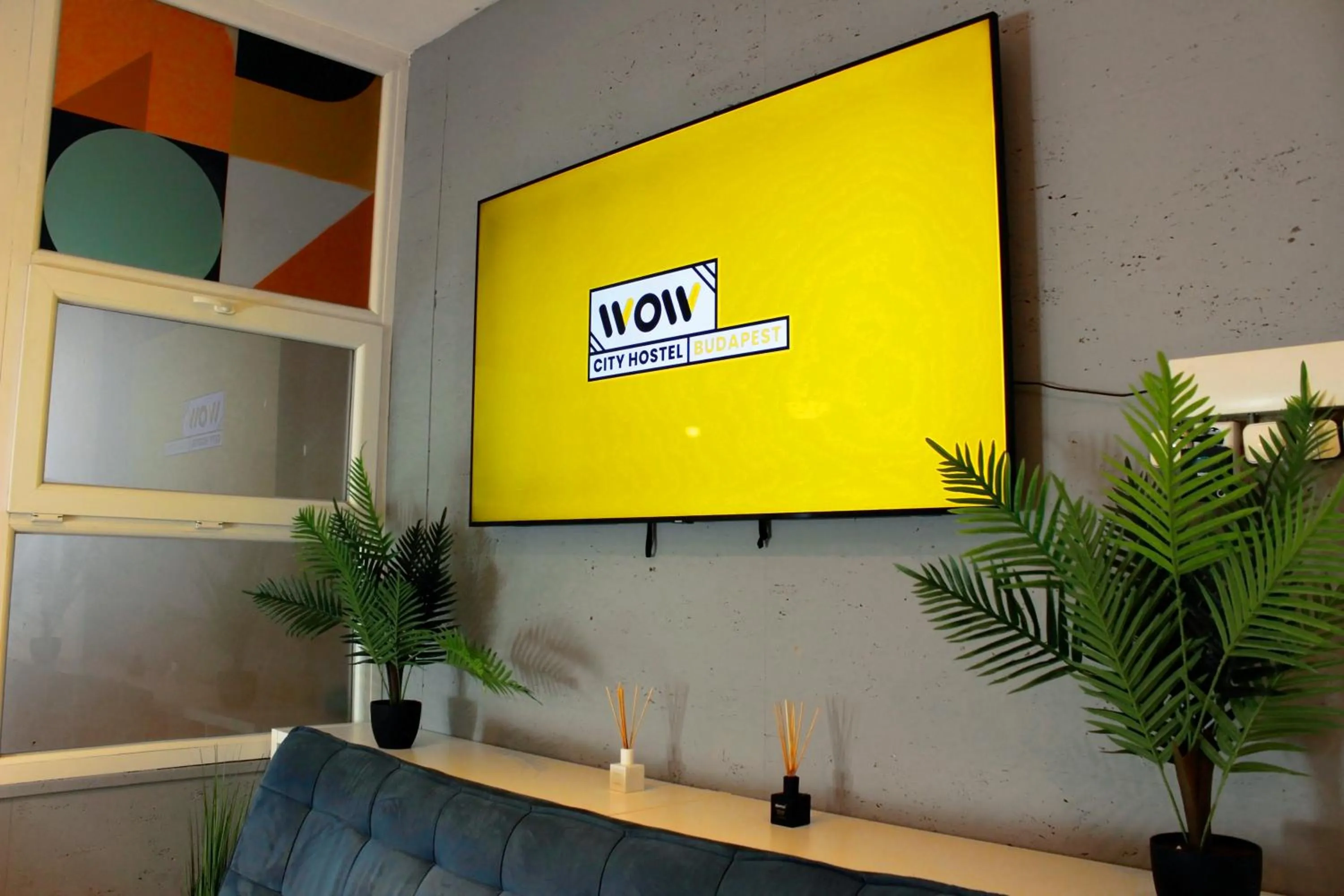 Communal lounge/ TV room in Absolut City Hostel Budapest