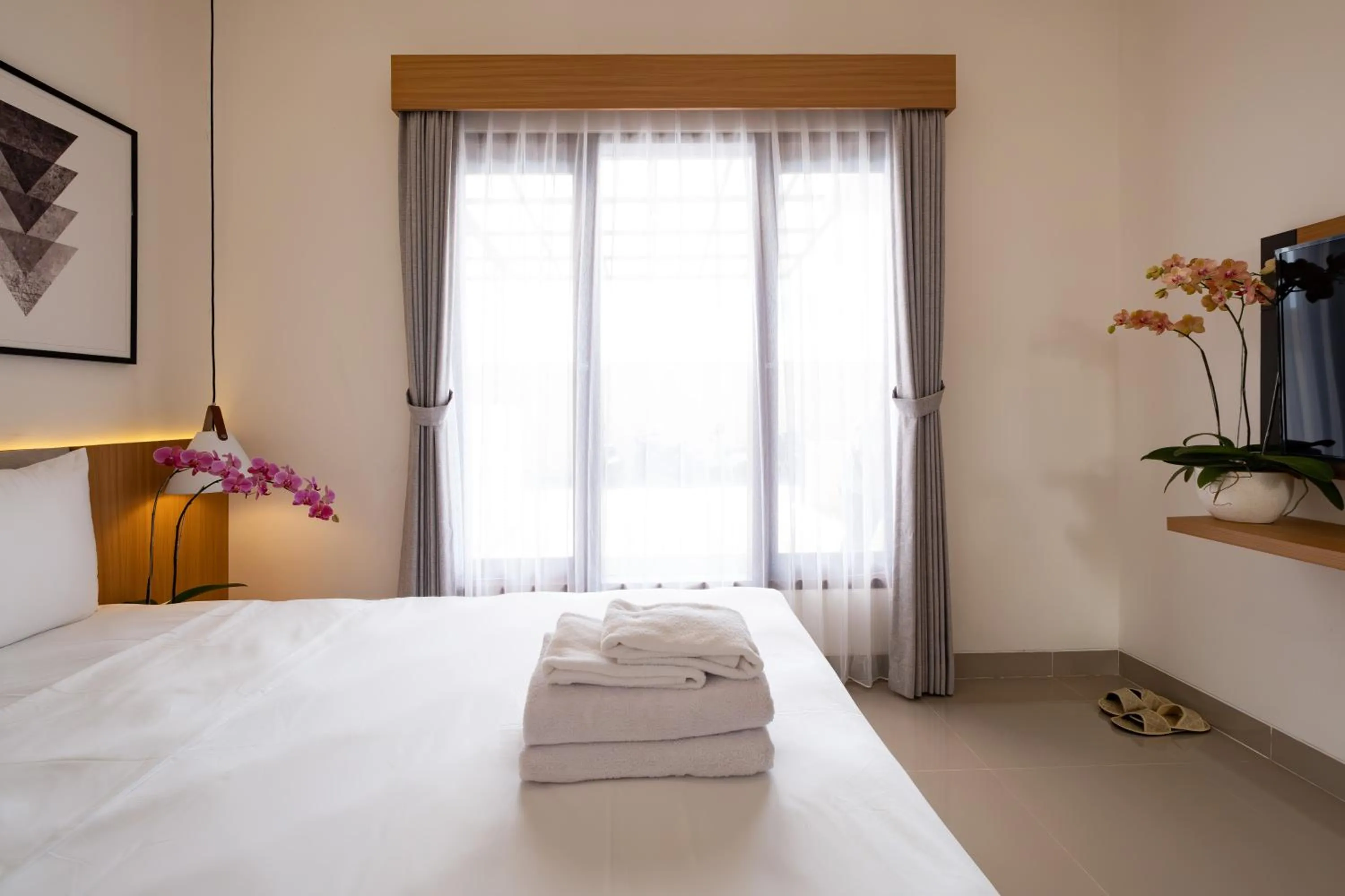 Bed in Taman Seminyak Suites