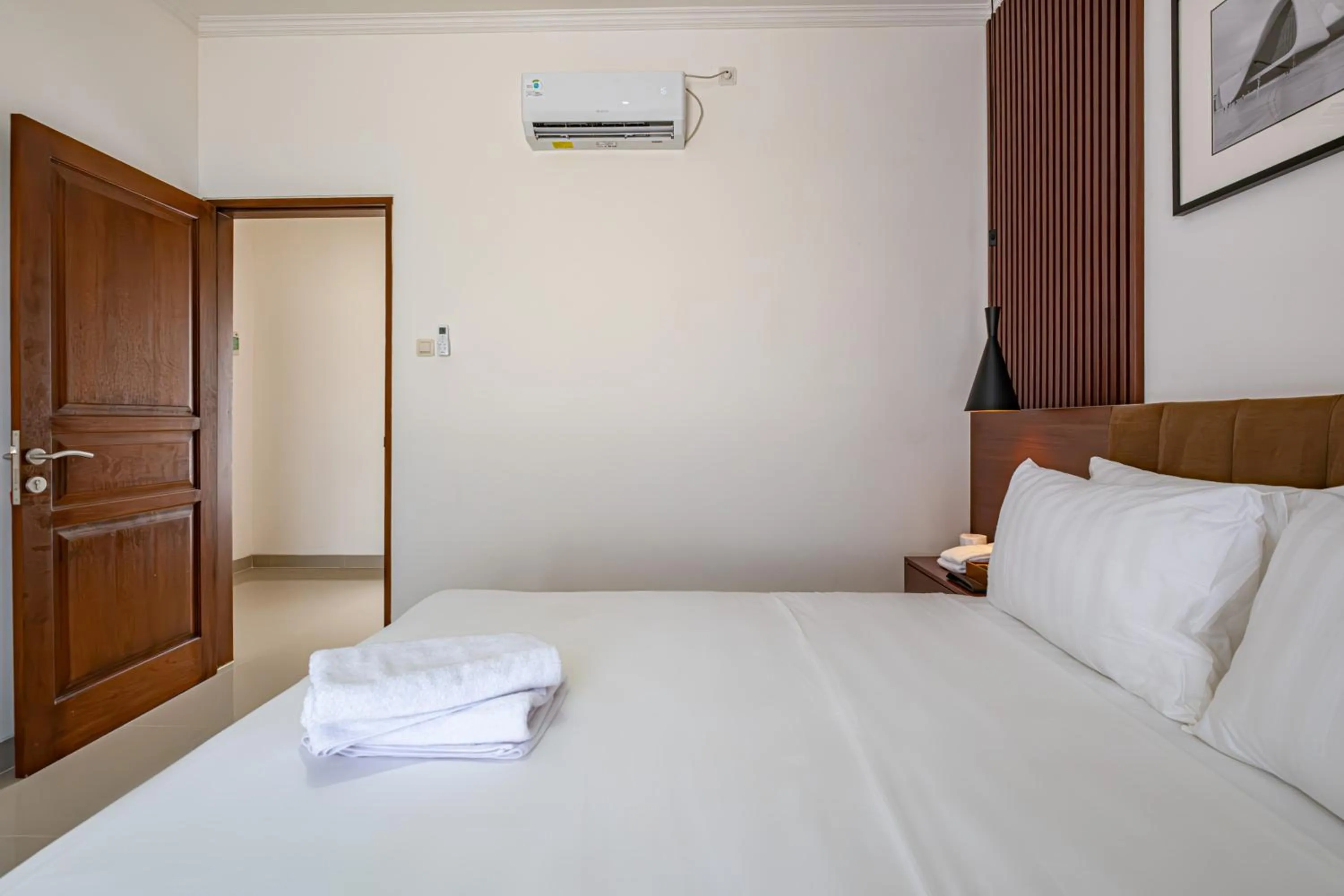 Bed in Taman Seminyak Suites