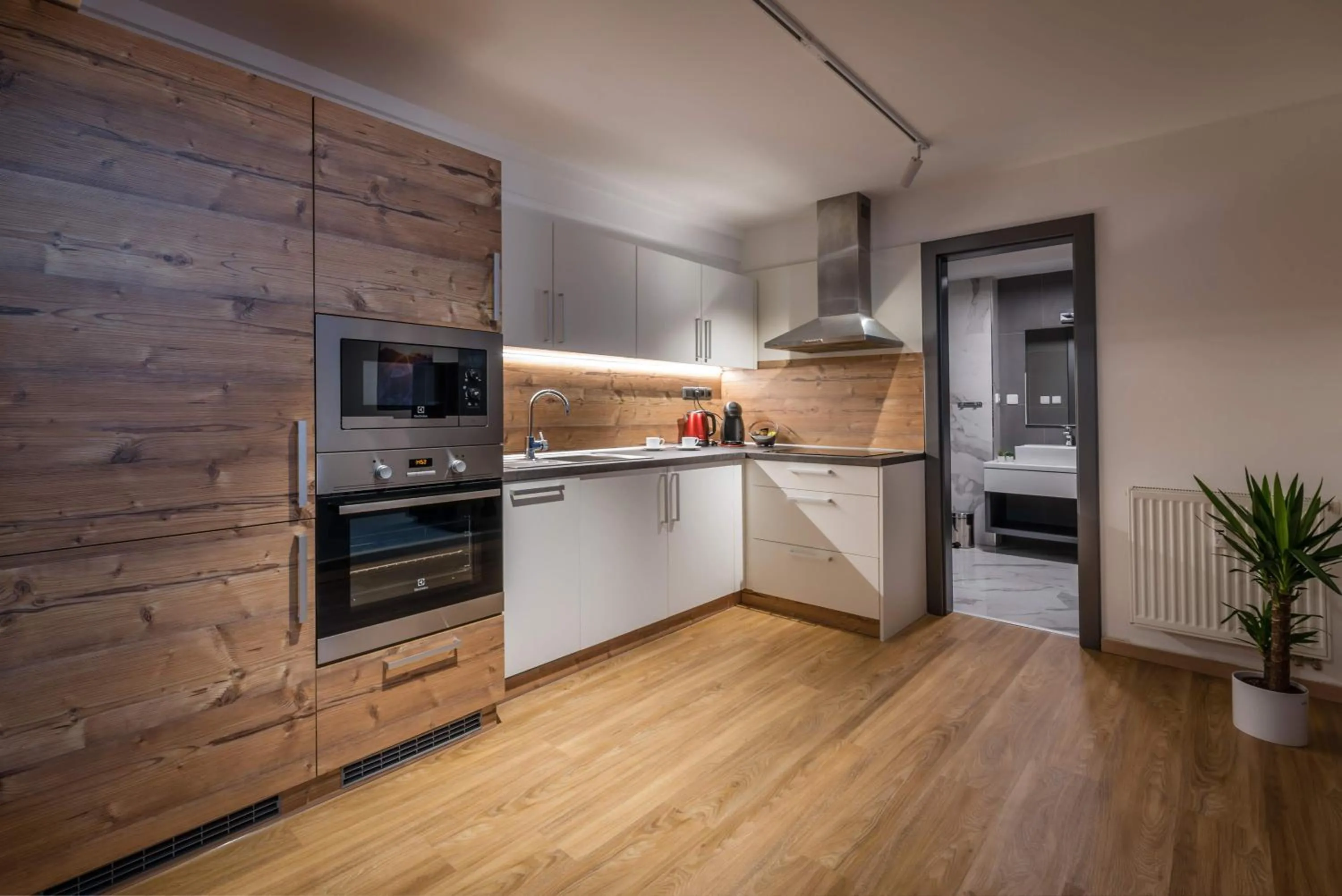 Kitchen or kitchenette in Apartman Smokovec