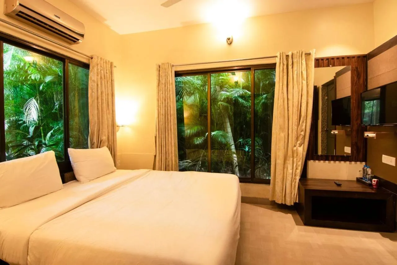 Bed in Silvanus Forest Retreat, Alibaug