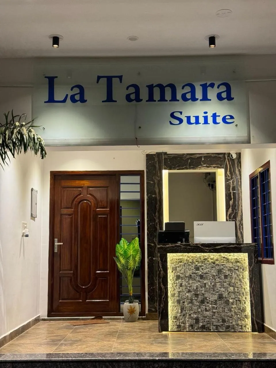 Property logo or sign in La Tamara Suite - TIE