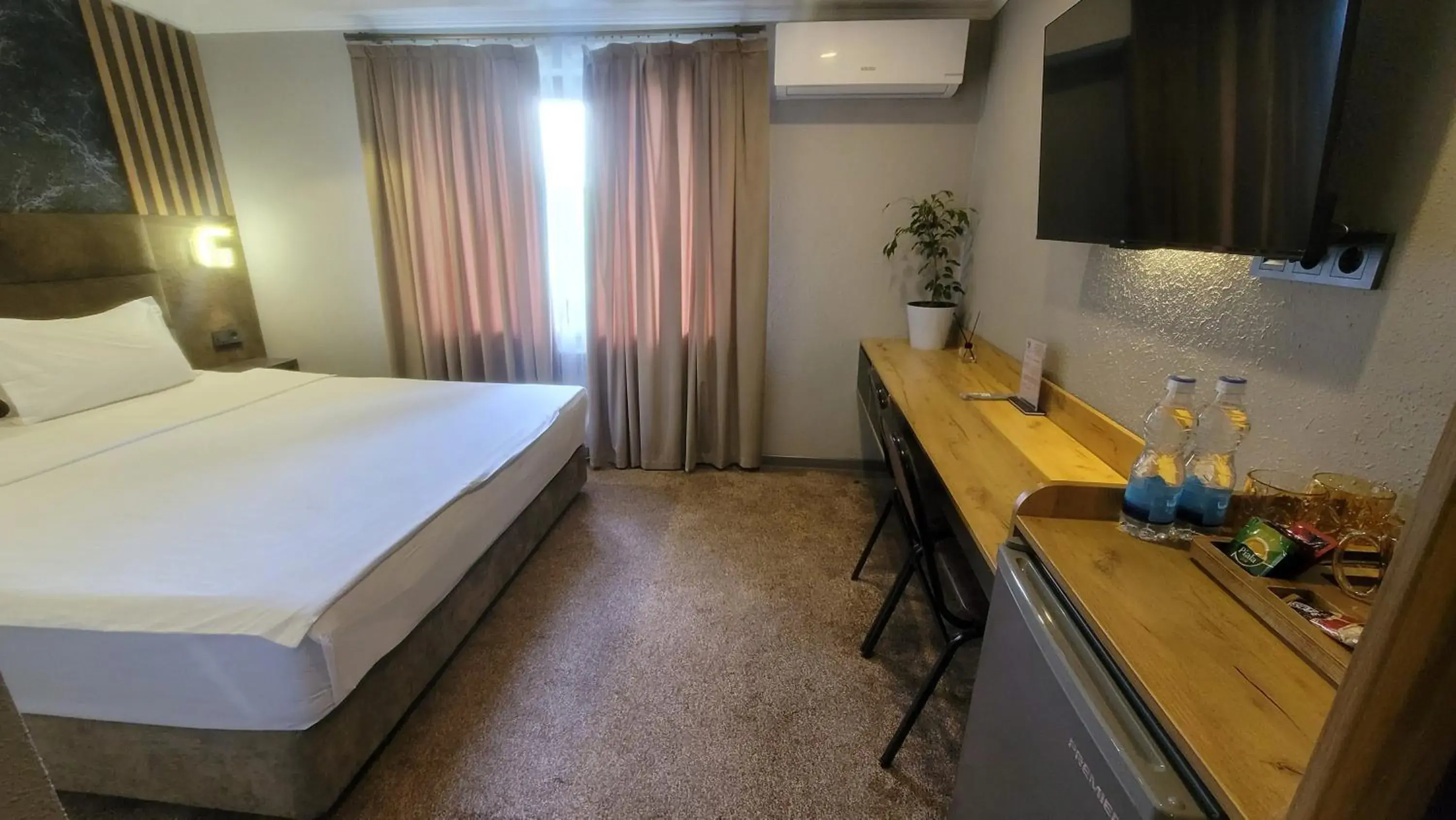 Bed in Homy House Hotel Bed in Homy House Hotel