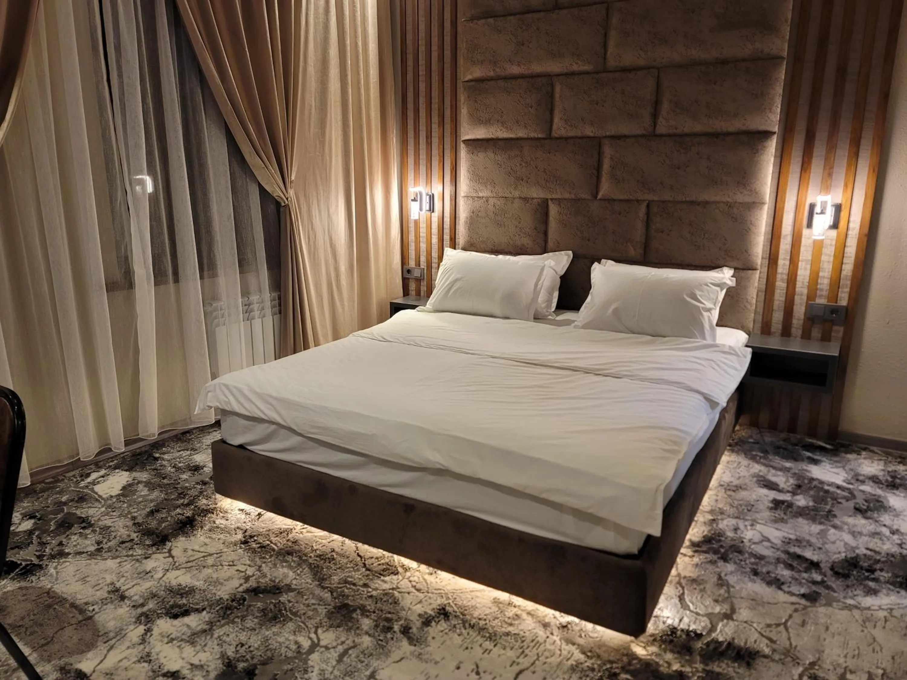 Bed in Homy House Hotel