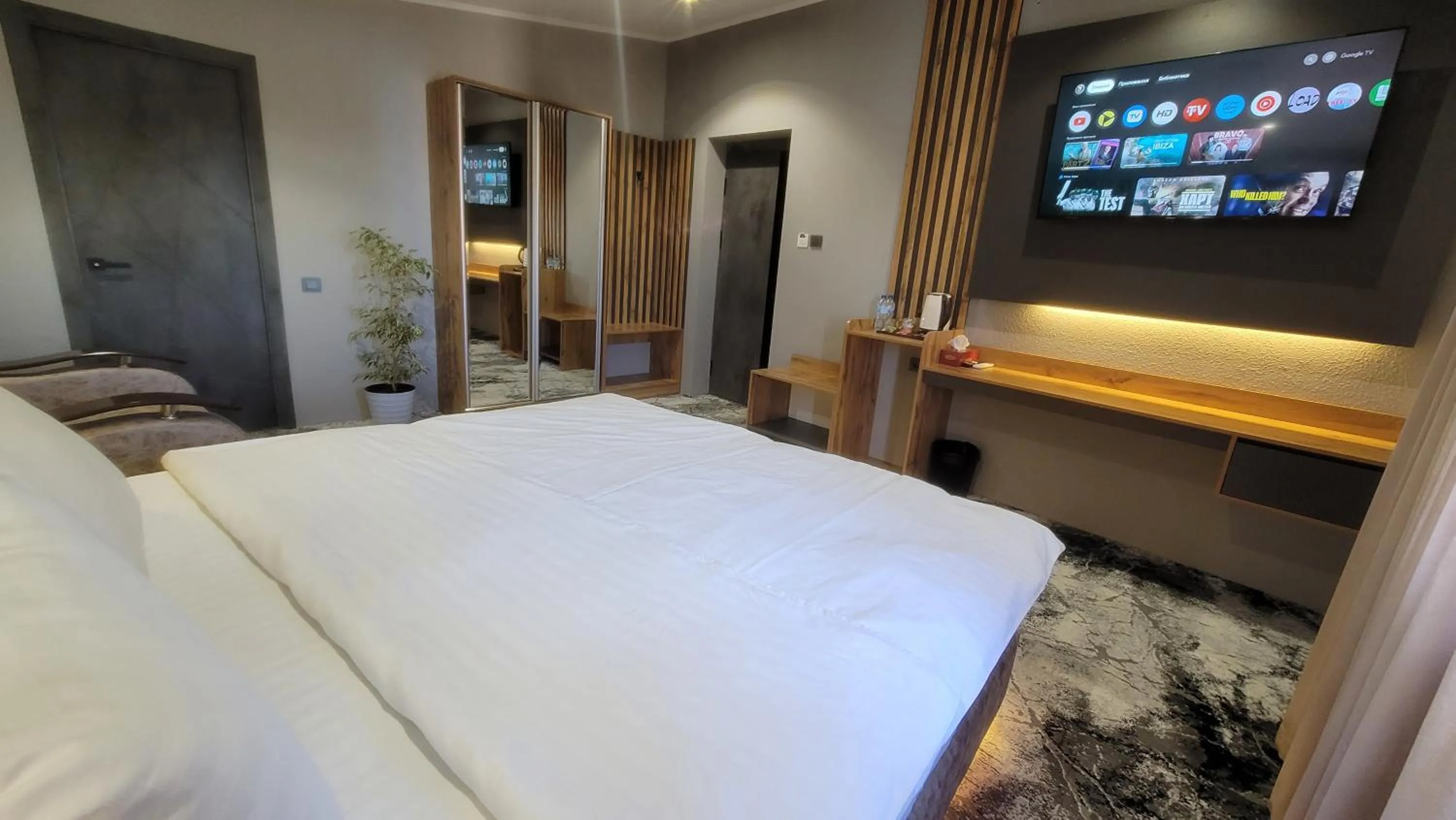 Bed in Homy House Hotel