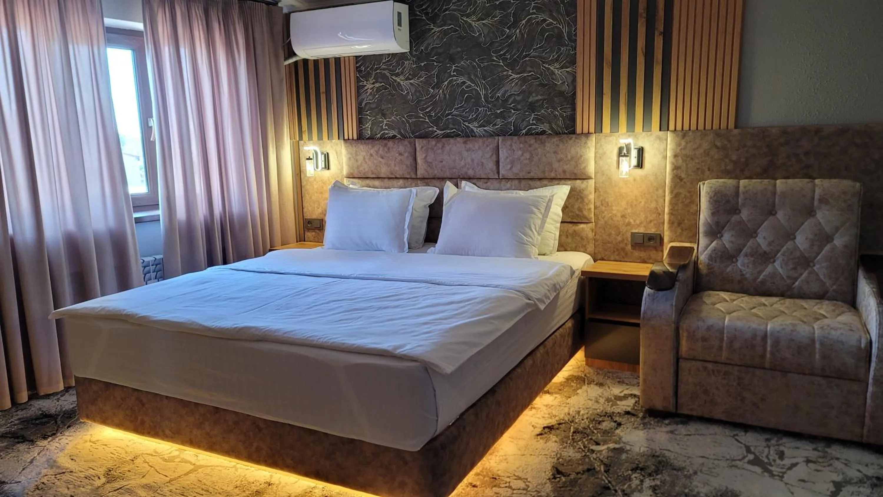 Bed in Homy House Hotel