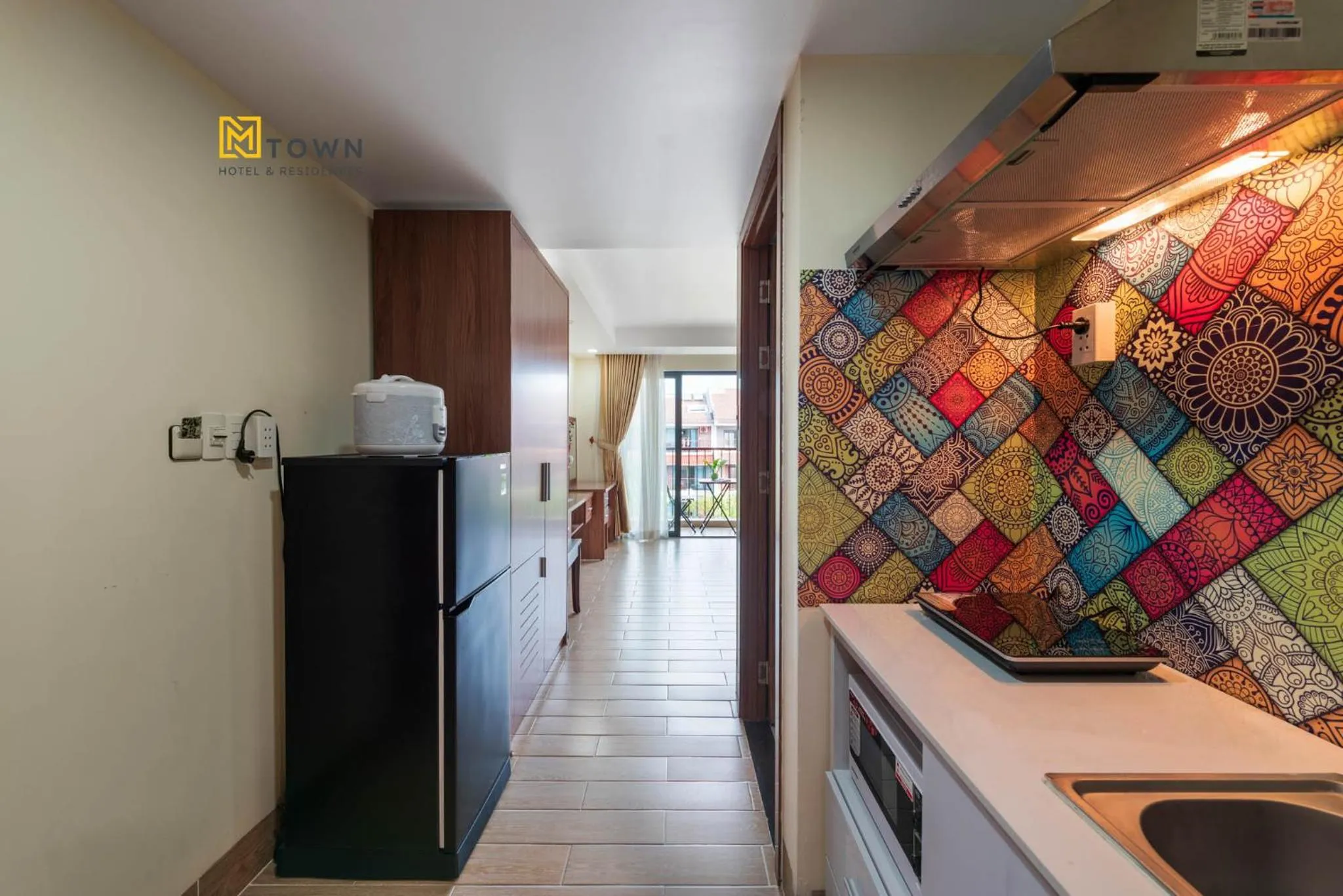 Kitchen or kitchenette in Luxy Park Hotel & Apartments - MTown
