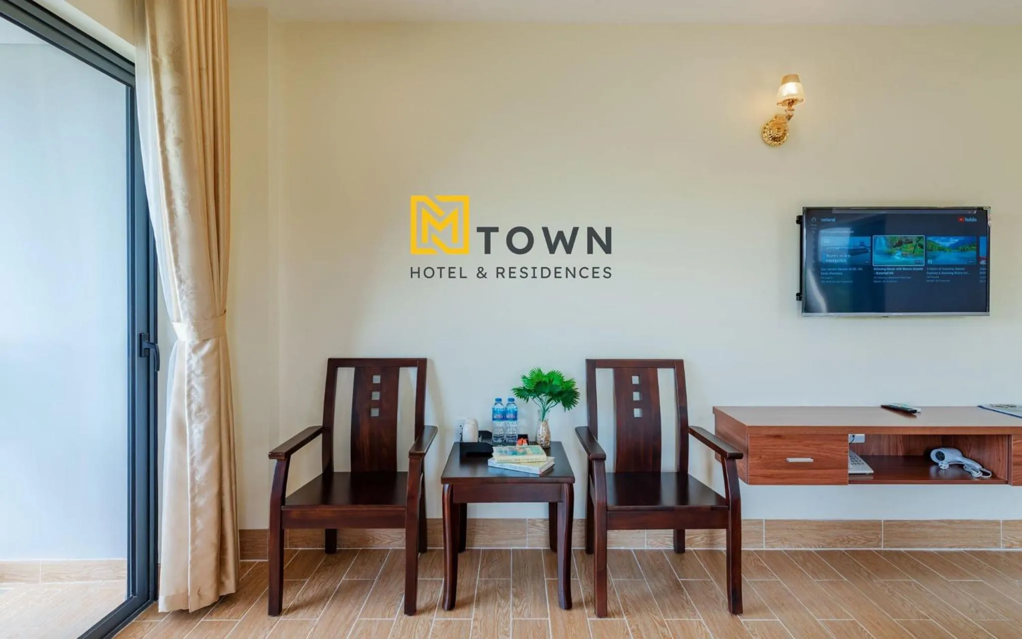 Property logo or sign in Luxy Park Hotel & Apartments - MTown