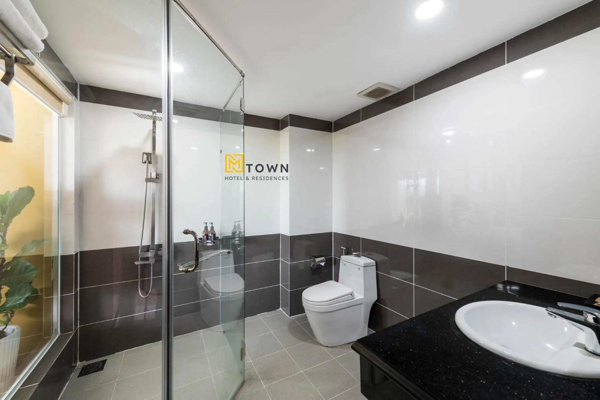 Shower in Luxy Park Hotel & Apartments - MTown