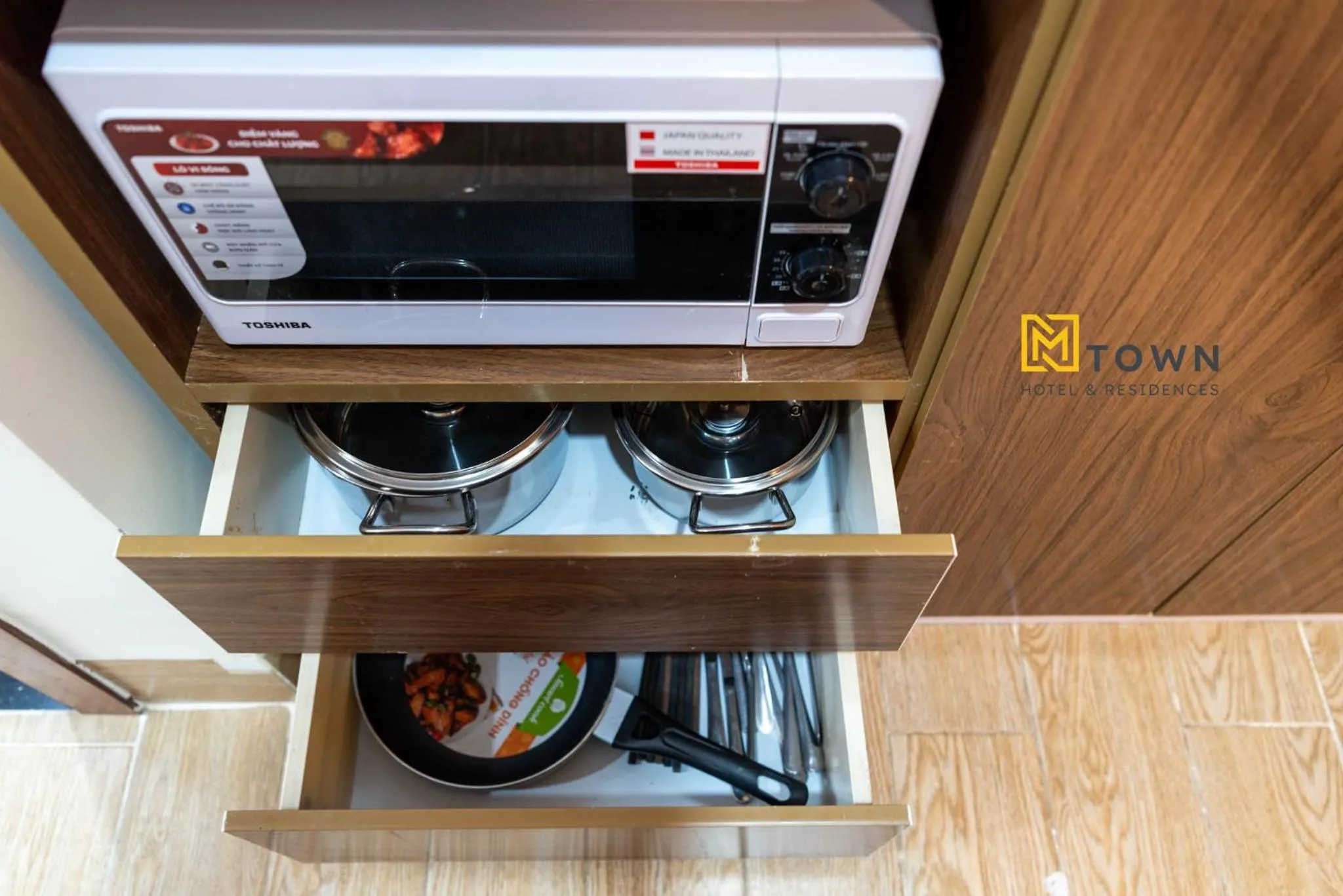 Kitchen or kitchenette in Luxy Park Hotel & Apartments - MTown