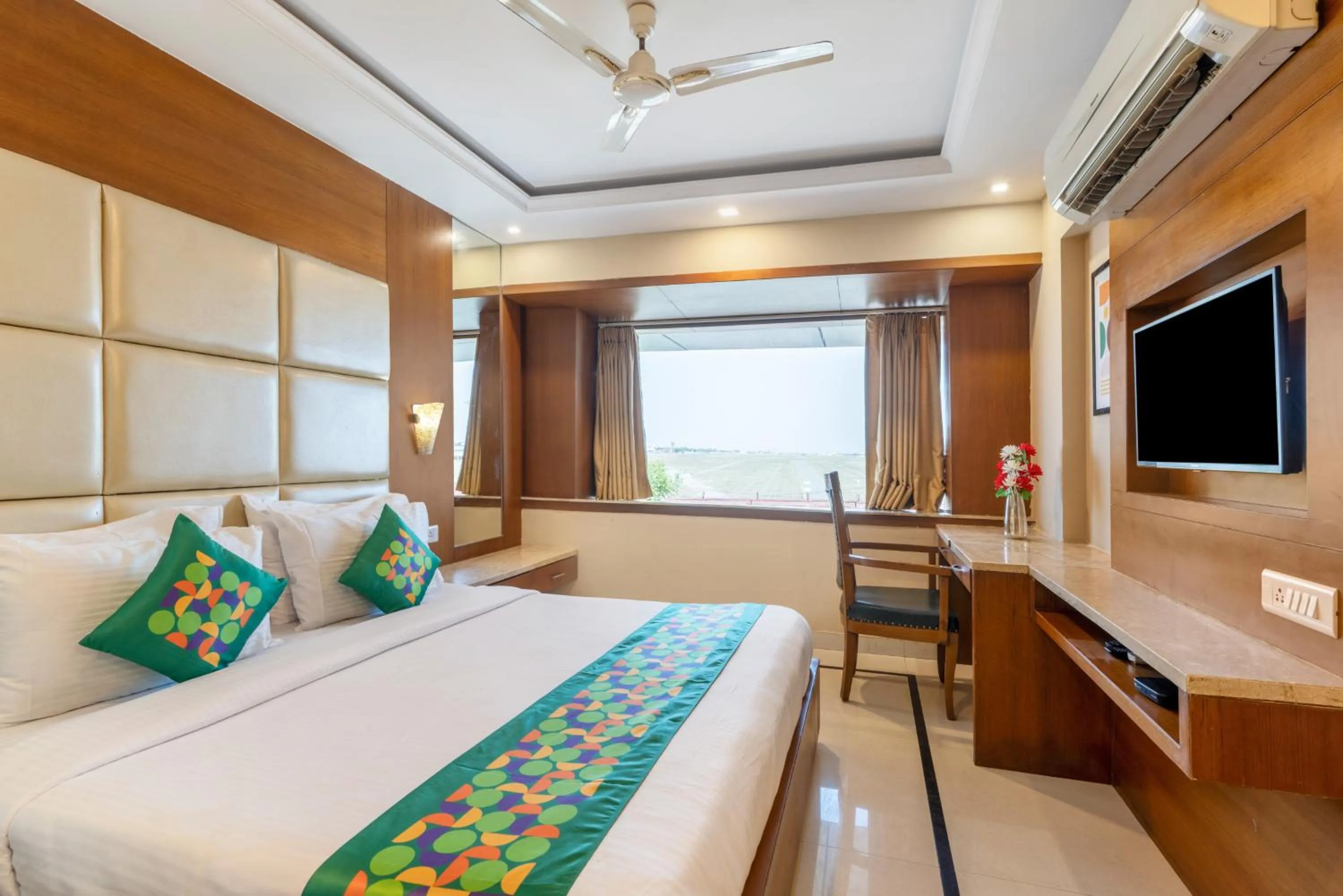 Bedroom, Bed in Treebo Premium Vinnie - Near Airport