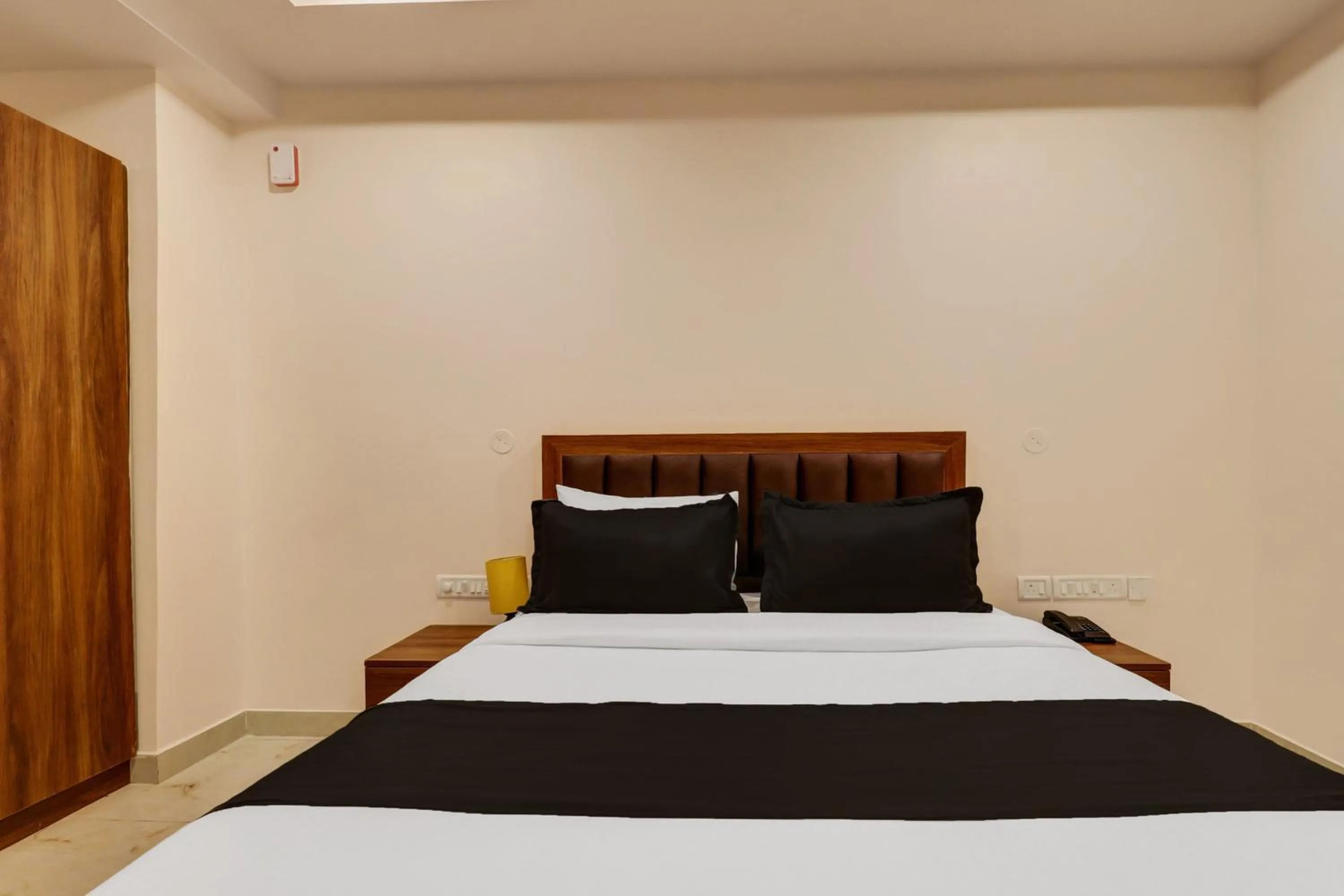 Bedroom, Bed in Super Townhouse Arekere Near Mithai Mahal