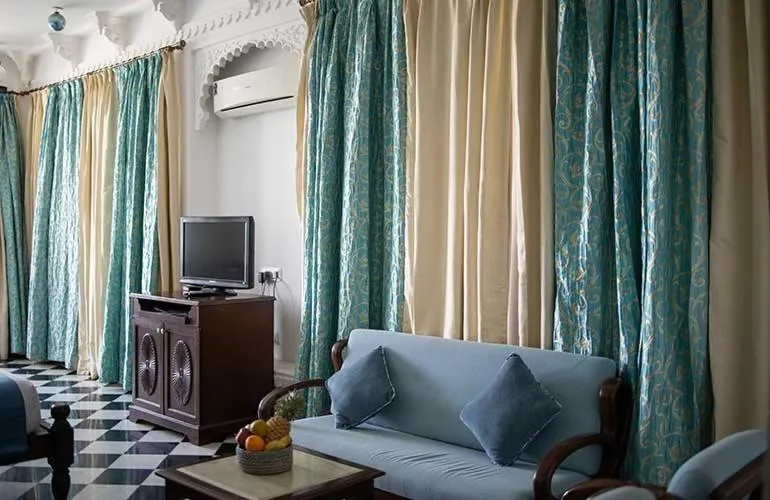 TV and multimedia in Swaroop Vilas - Lake Facing Boutique Hotel