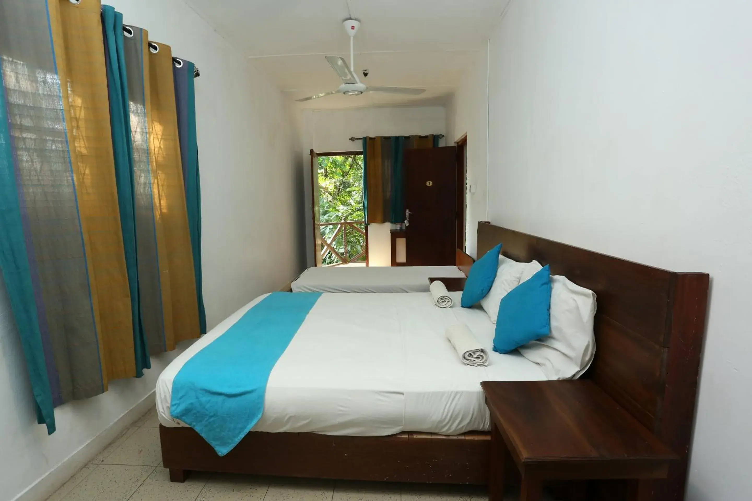 Photo of the whole room, Bed in Tree Breeze Inn Photo of the whole room, Bed in Tree Breeze Inn