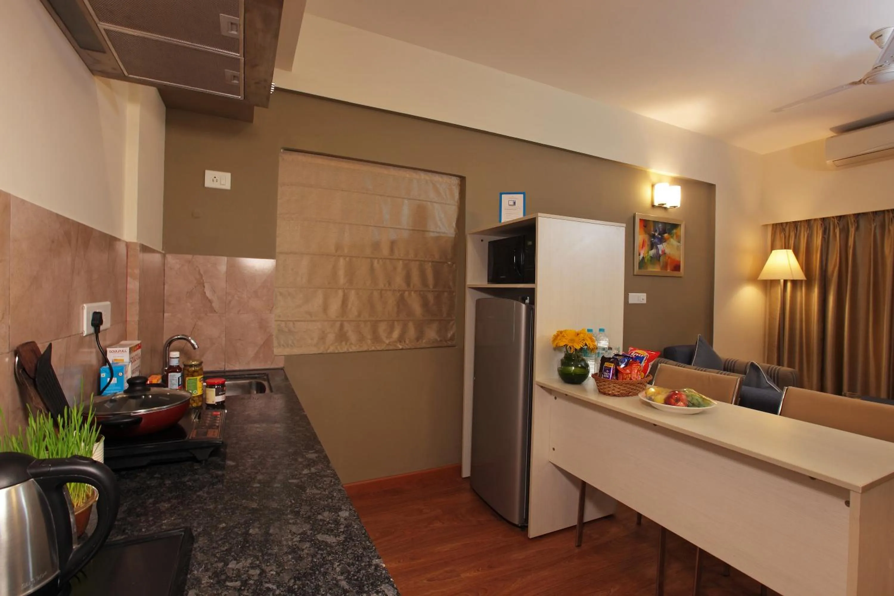 Kitchen or kitchenette in Starlit Suites Bangalore