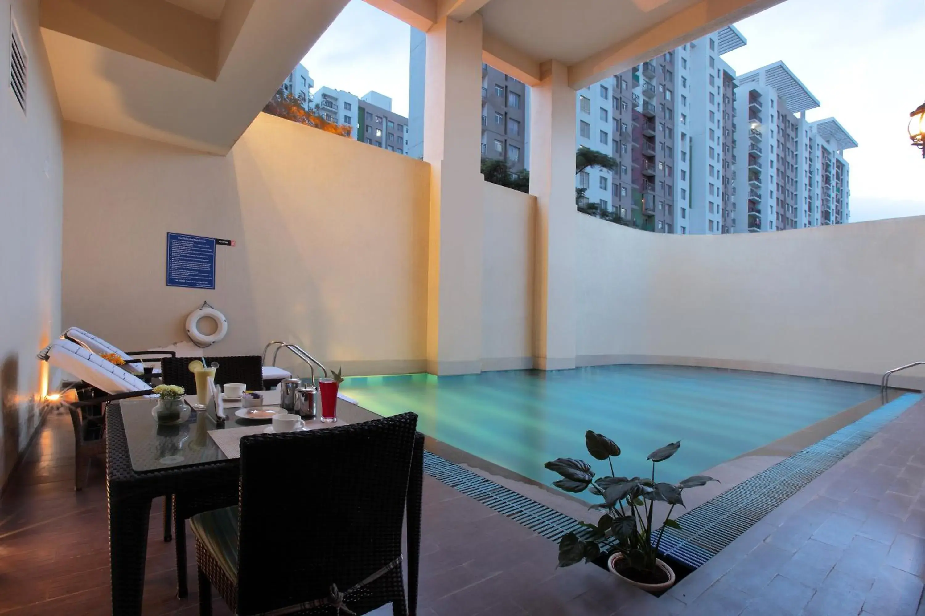 Swimming pool in Starlit Suites Bangalore Swimming pool in Starlit Suites Bangalore