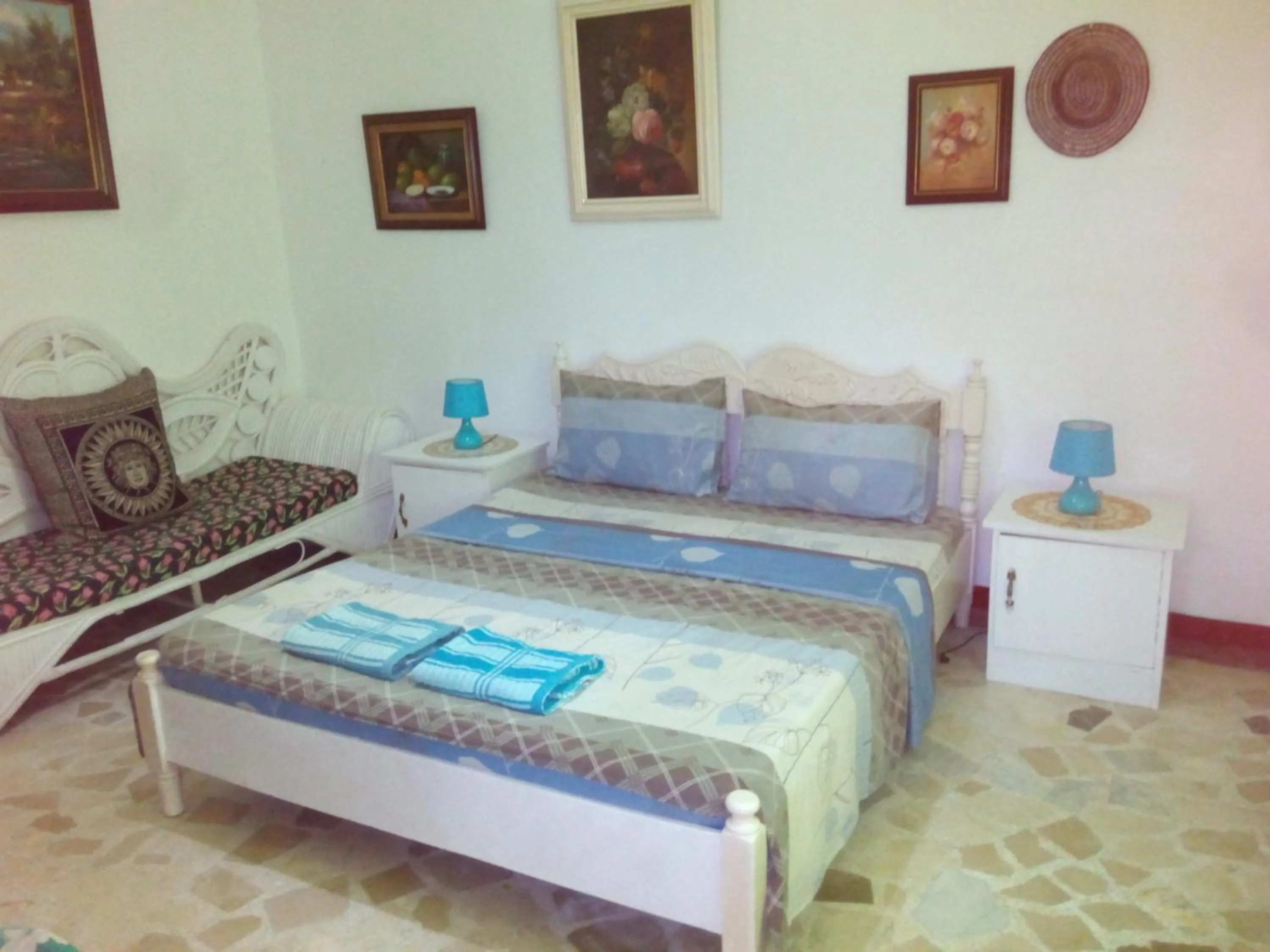 Bed in White & Yellow Castle Hotel and Resort