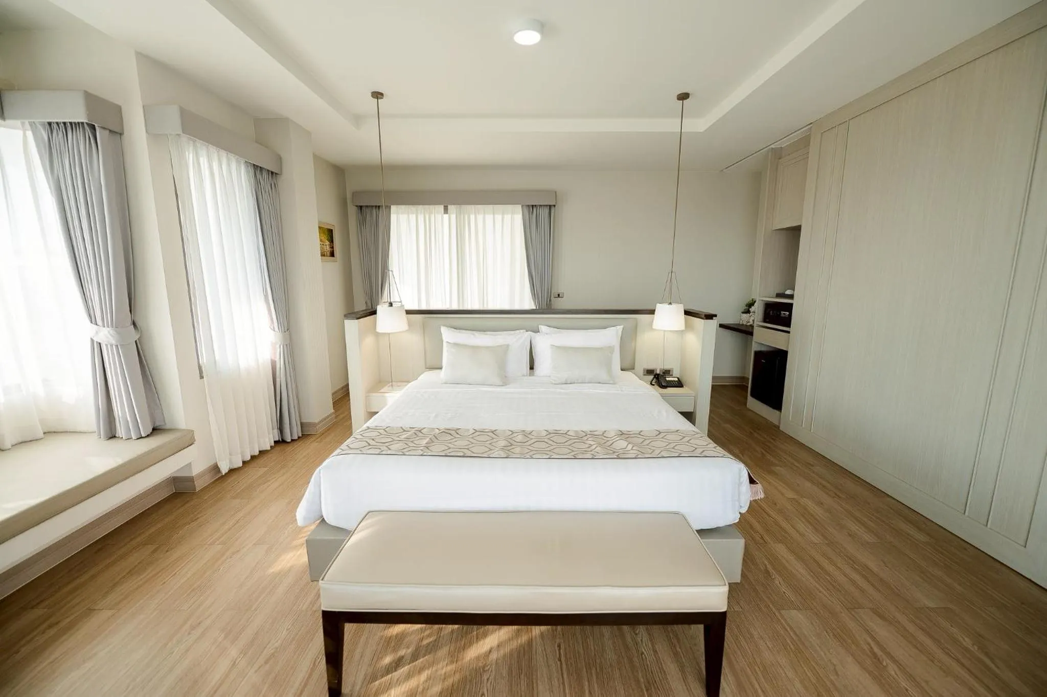 Bed in THE NAVY HOUSE HOTEL