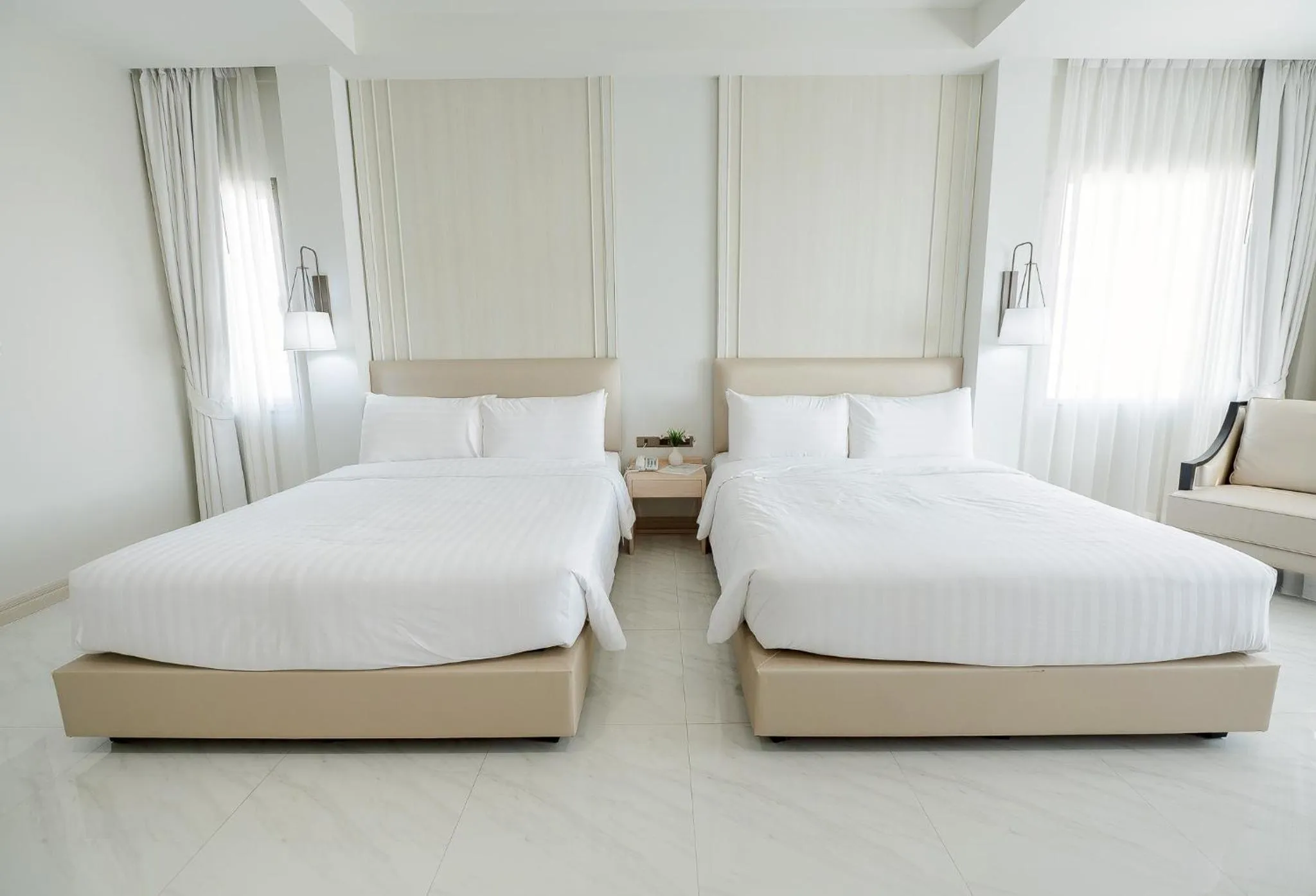 Bed in THE NAVY HOUSE HOTEL