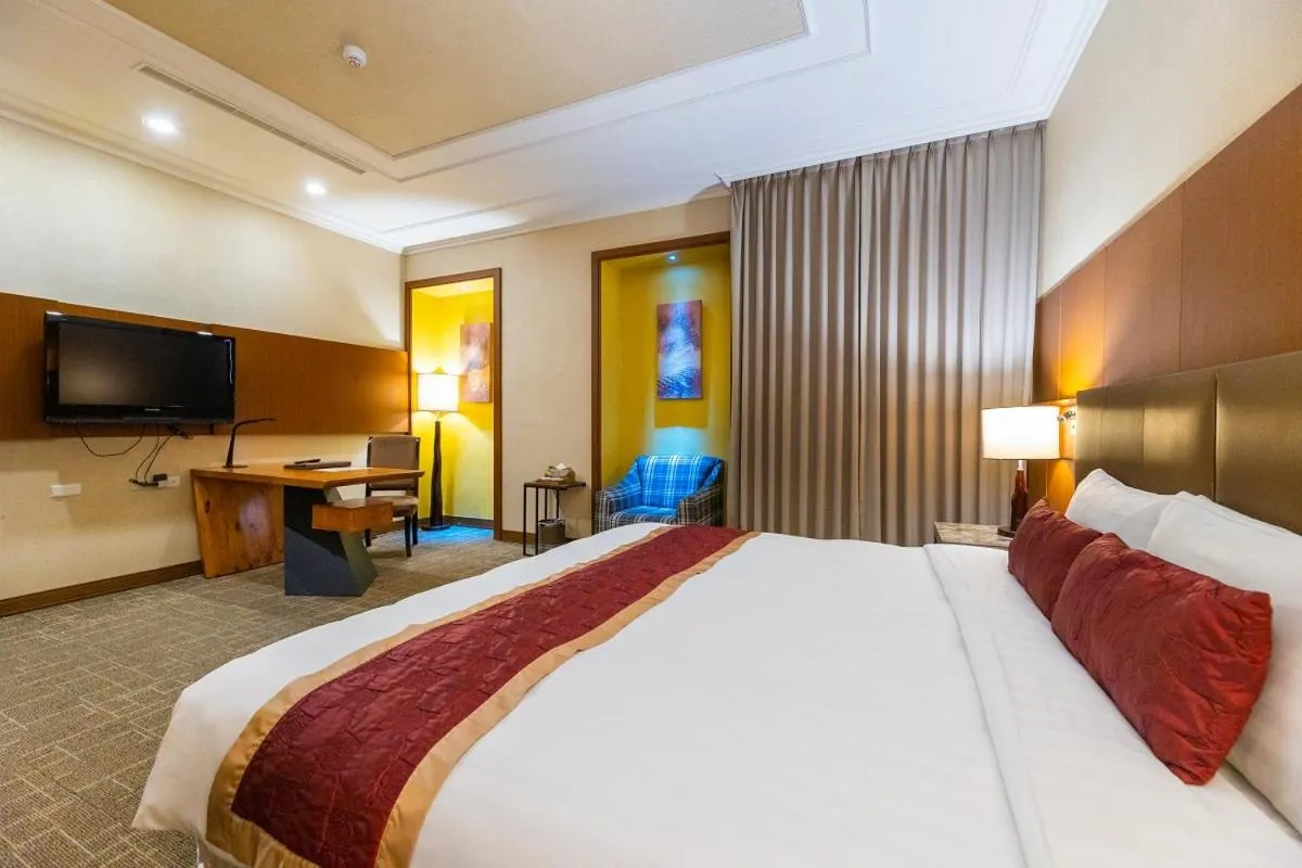 Photo of the whole room, Bed in Golden Tulip - Aesthetics