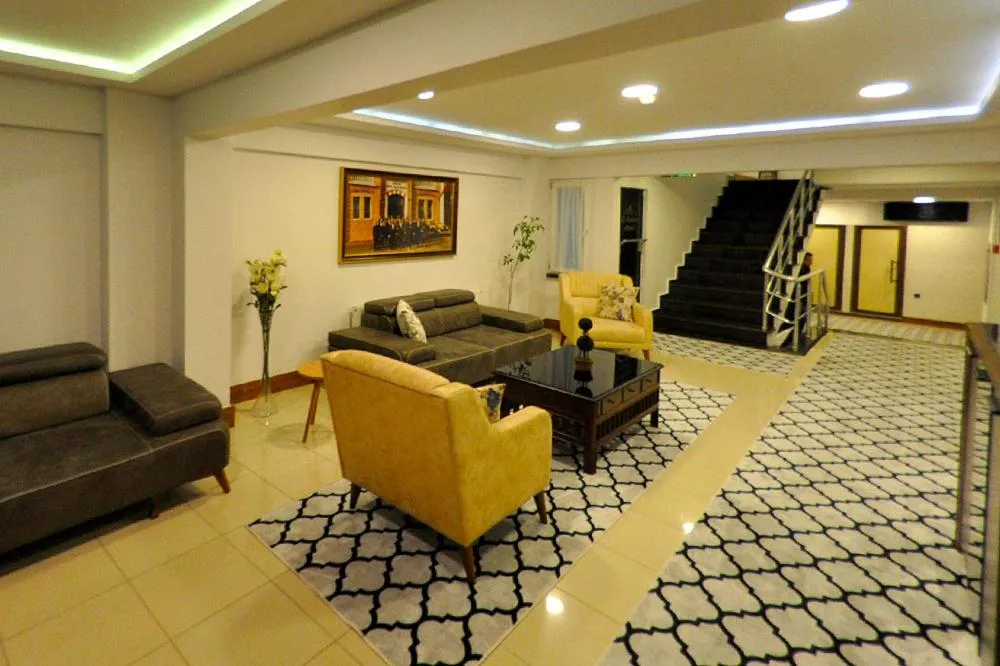 Communal lounge/ TV room in Atlantik Butik Hotel