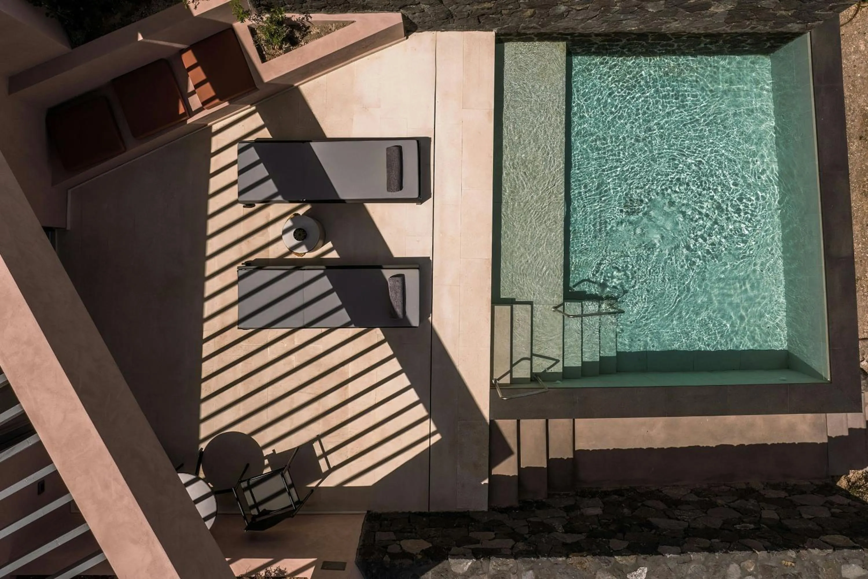 Swimming pool in Domes Novos Santorini, Autograph Collection