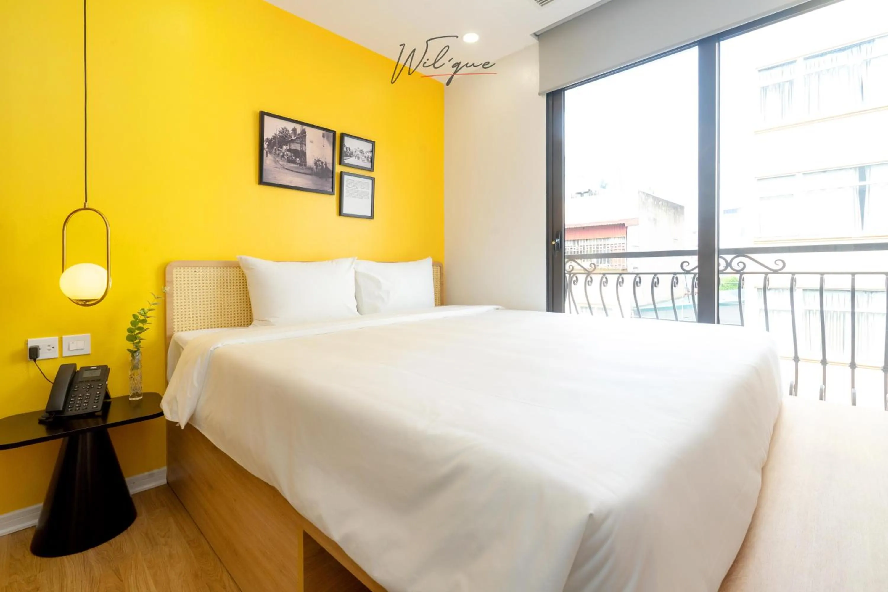 Photo of the whole room, Bed in Wilque Hotel Hanoi