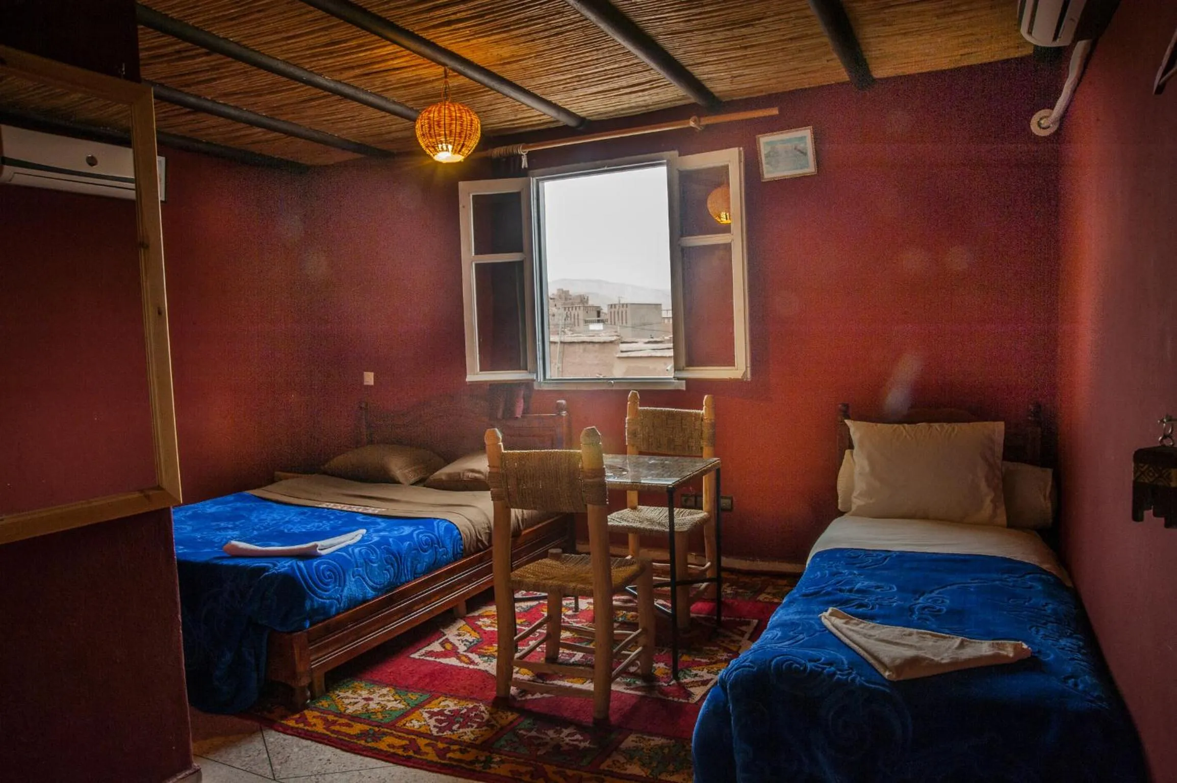 Landmark view, Bed in La Baraka Auberge