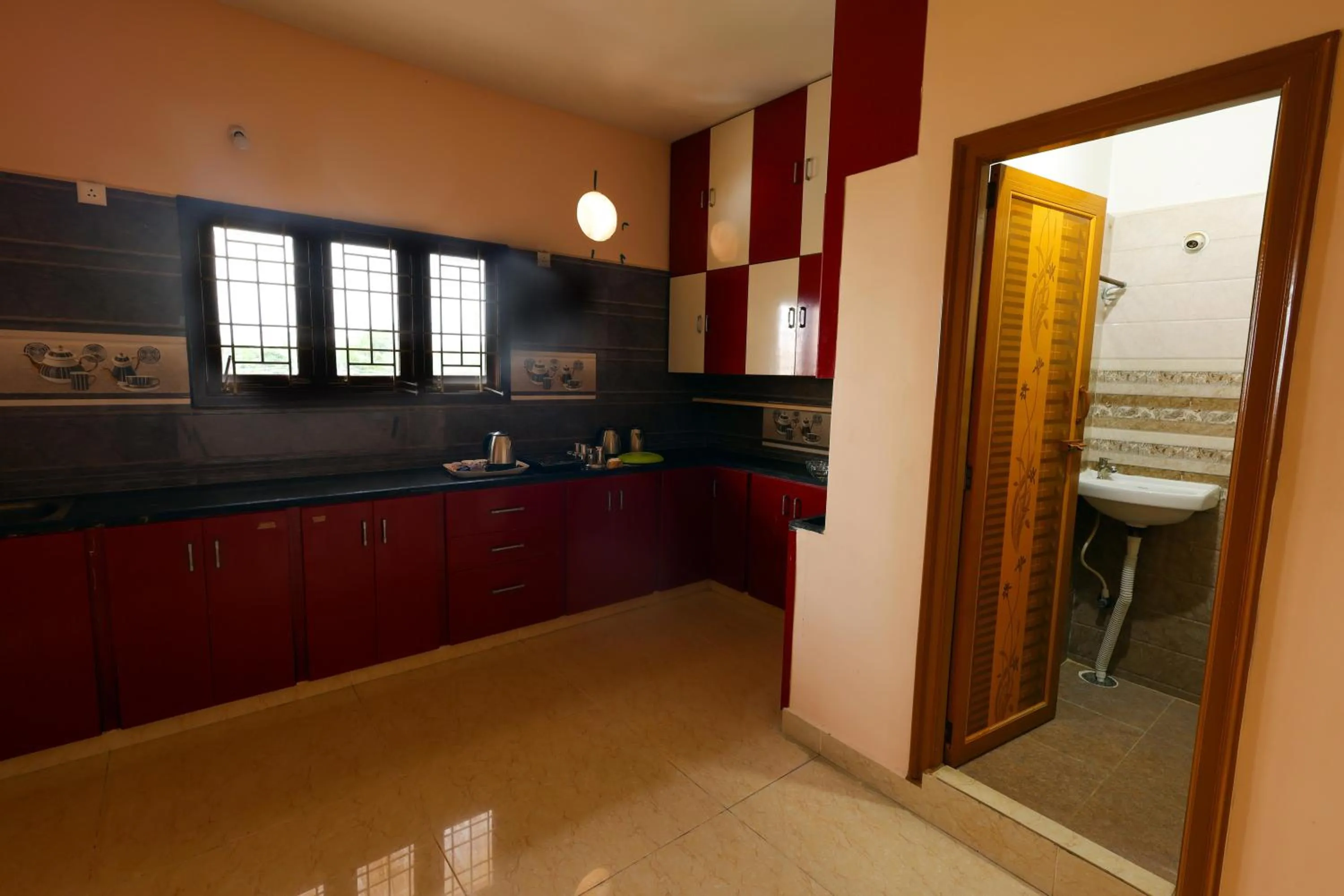 Kitchen or kitchenette in SBHS Homestay - Garudadri - Tirupati Bus Stand