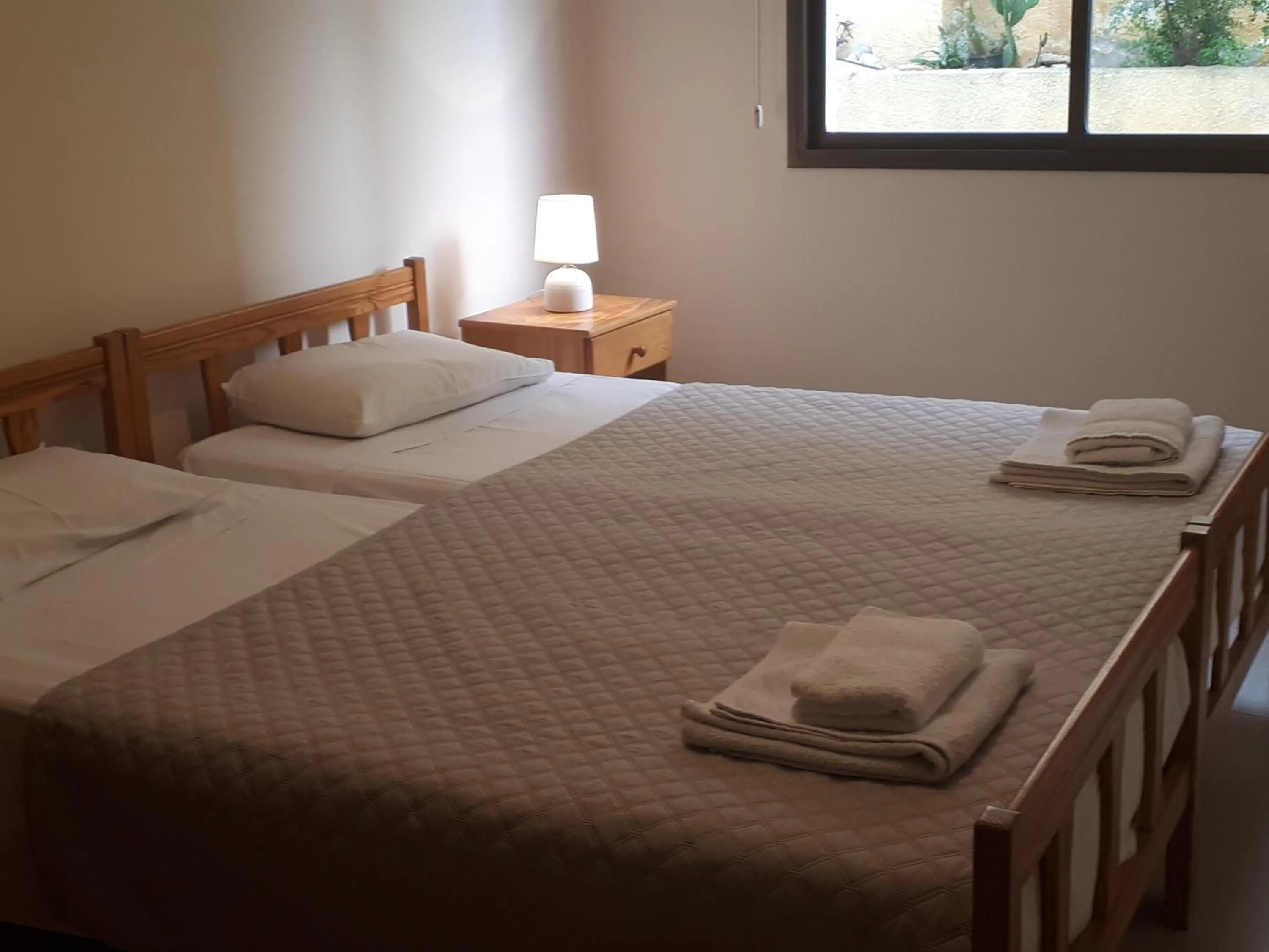 Bed in Droushia Holiday Apartments