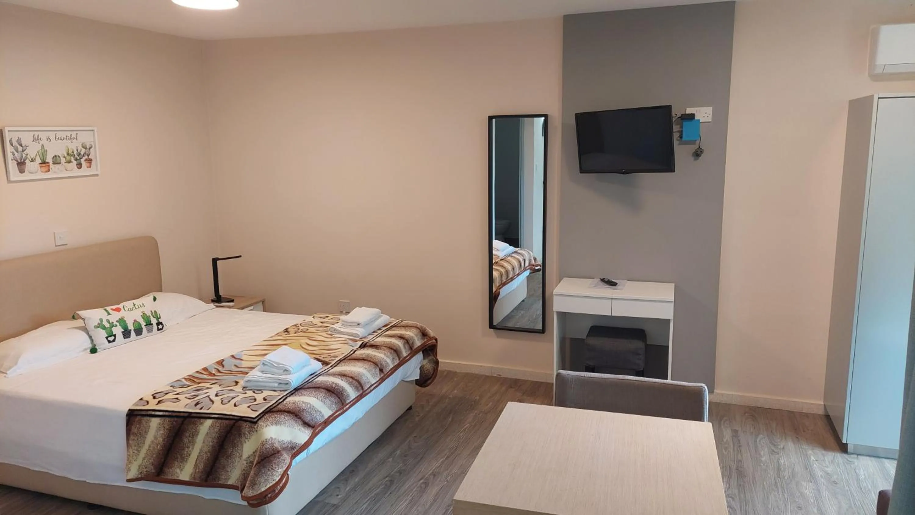 Bed in Droushia Holiday Apartments