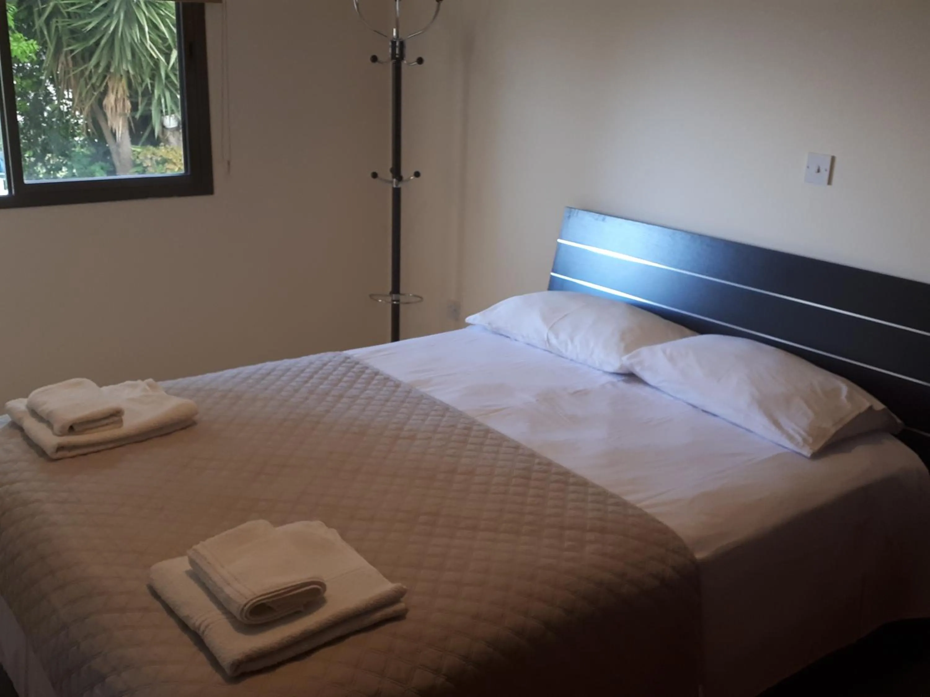 Bed in Droushia Holiday Apartments