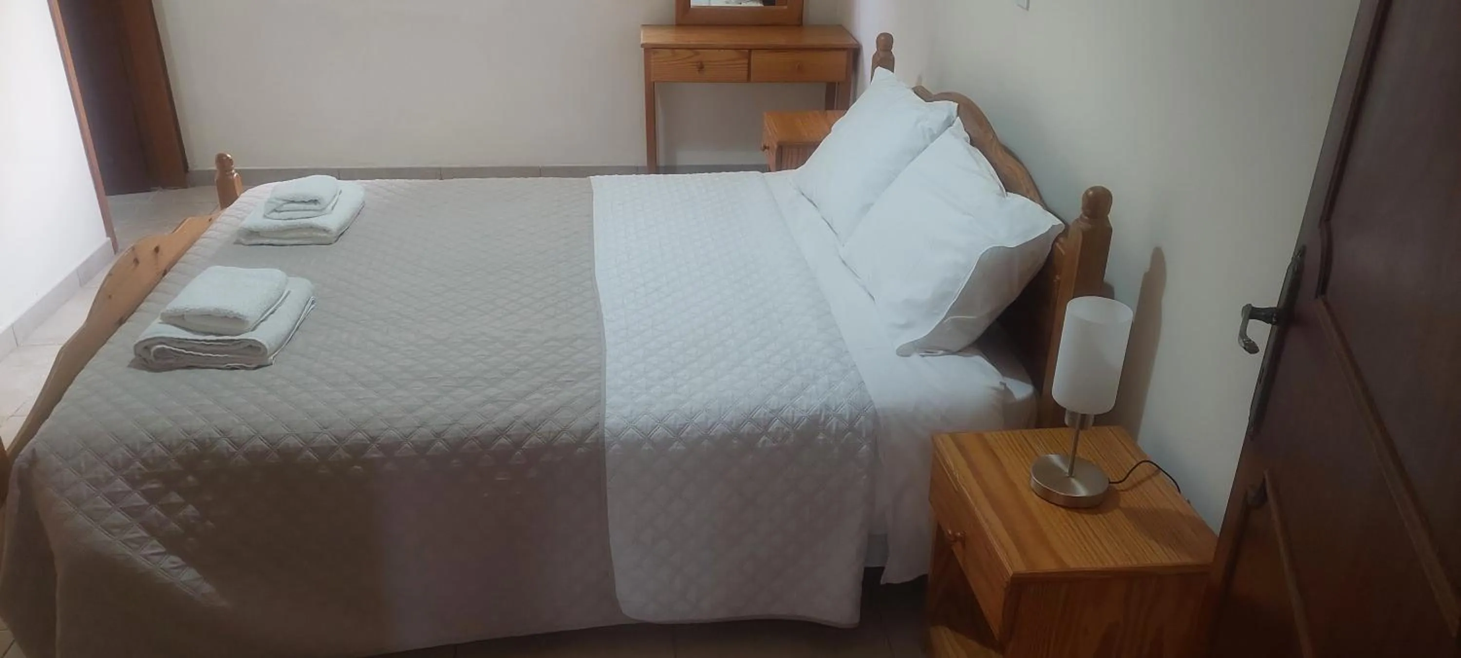 Bed in Droushia Holiday Apartments