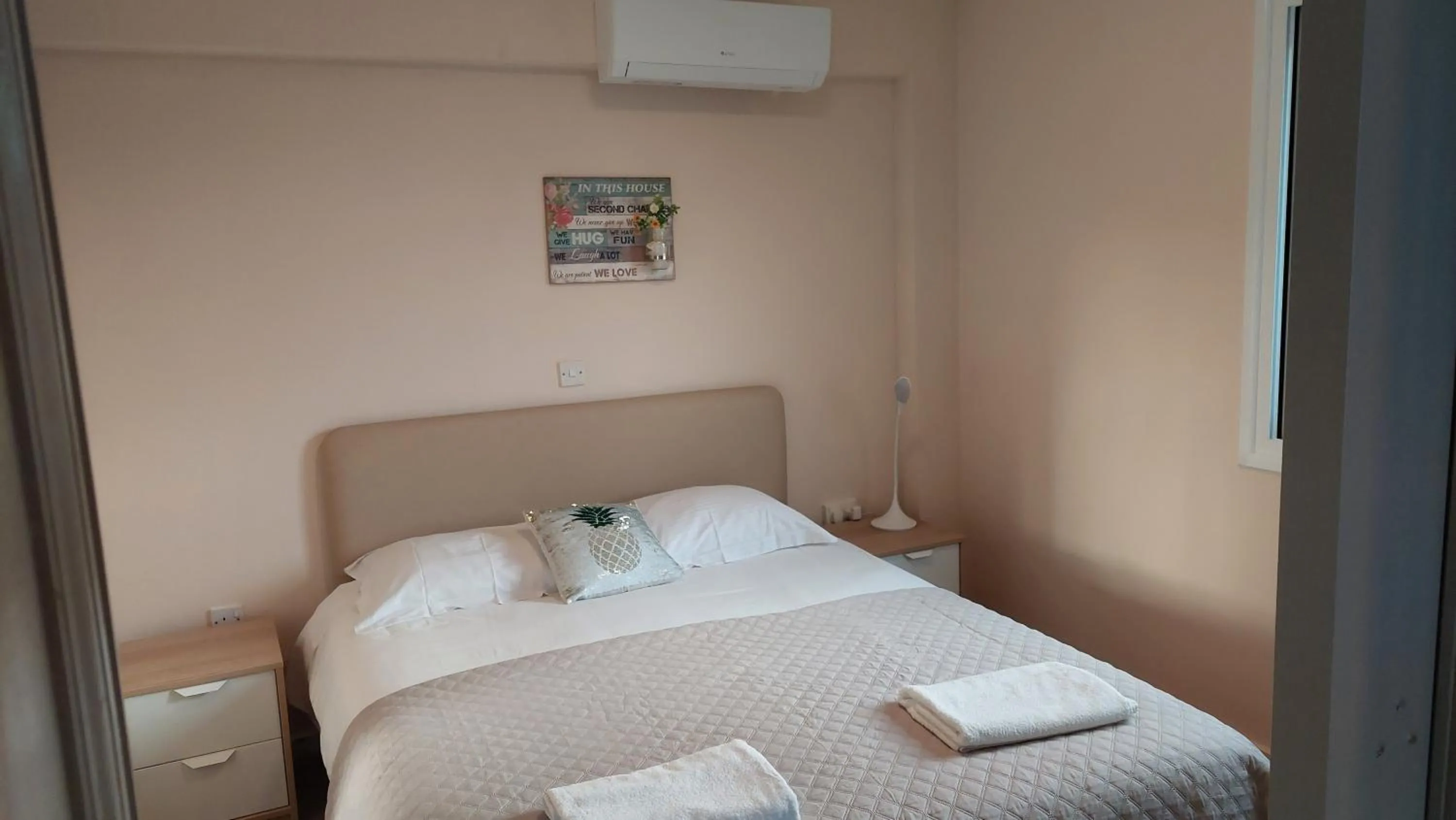Bed in Droushia Holiday Apartments
