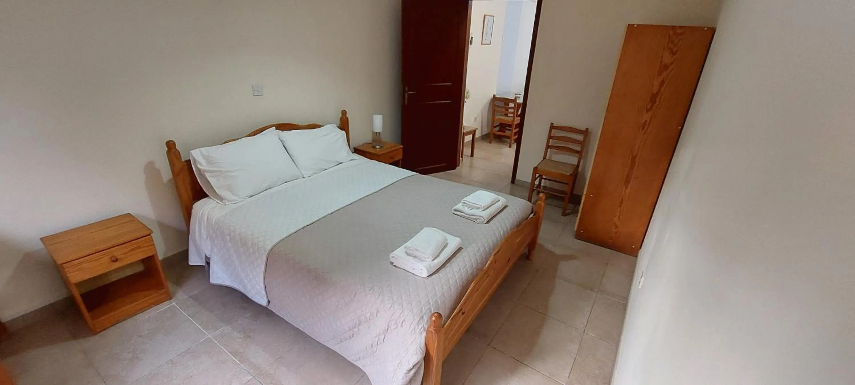 Bed in Droushia Holiday Apartments