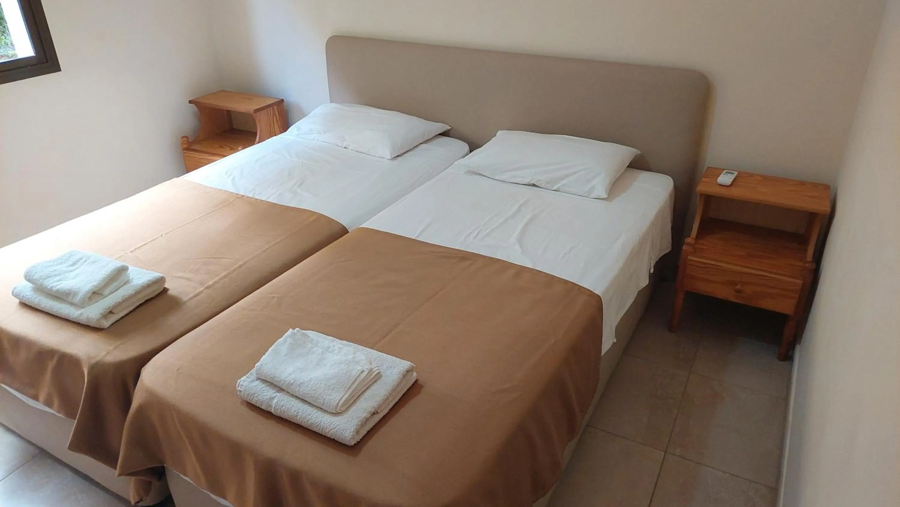 Bed in Droushia Holiday Apartments