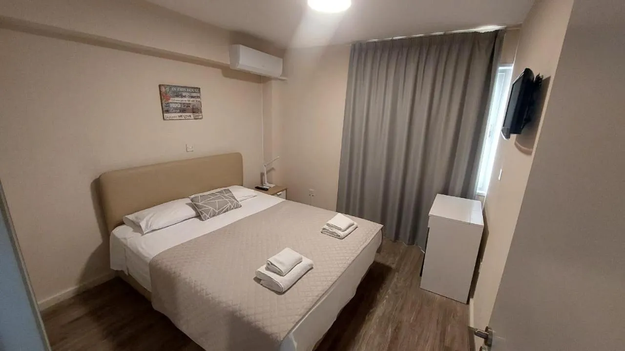 Bed in Droushia Holiday Apartments