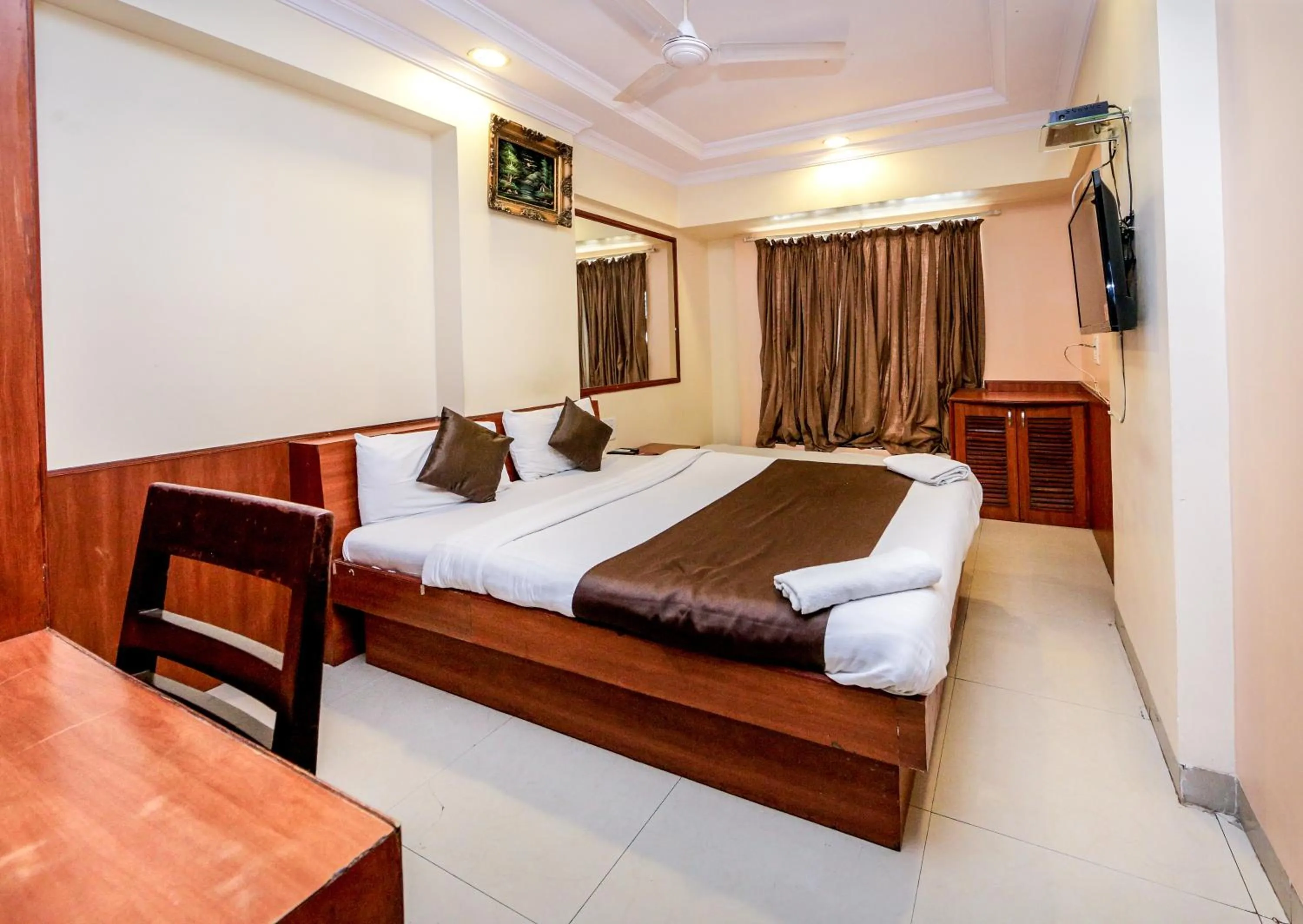 Photo of the whole room, Bed in Hotel Lucky Goregaon