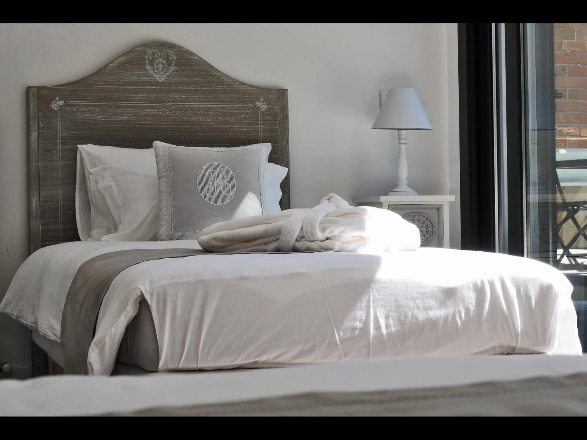 Bed in La Dependance by Cocoonr