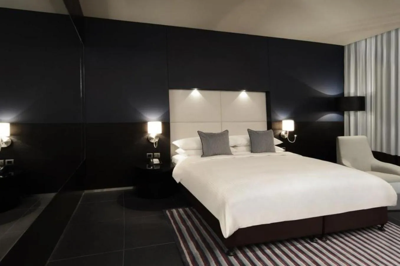 Photo of the whole room, Bed in The Abdali Boulevard Hotel