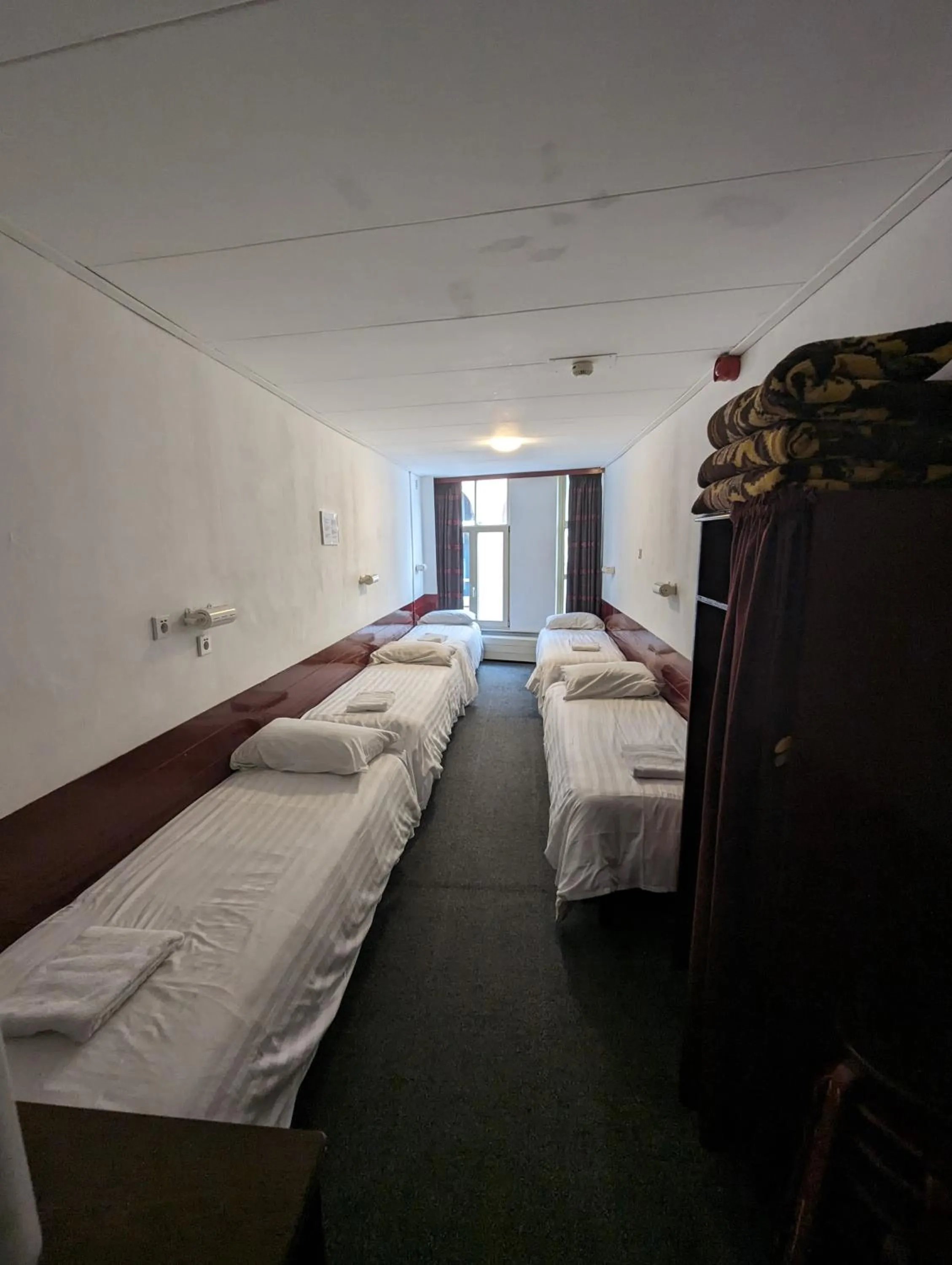 Bed in Budget Hotel Ben