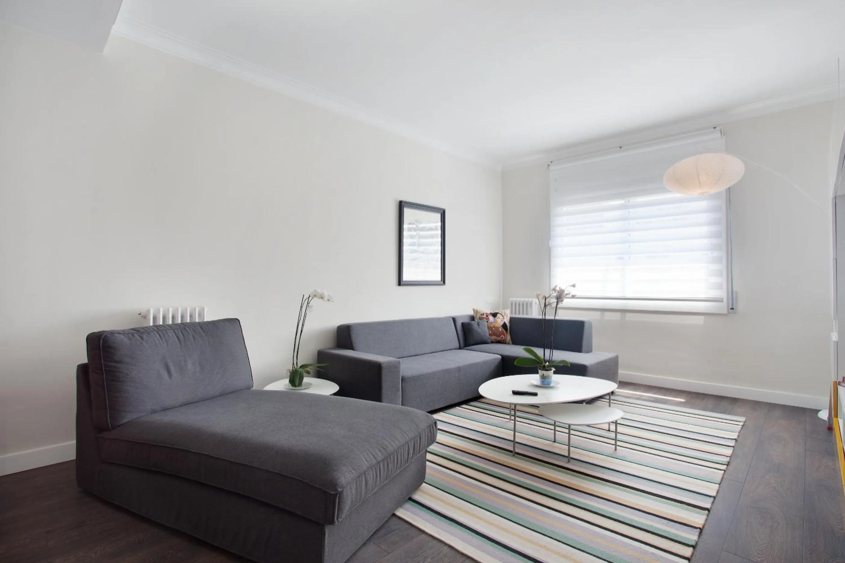 Living room in Consell de Cent Apartment