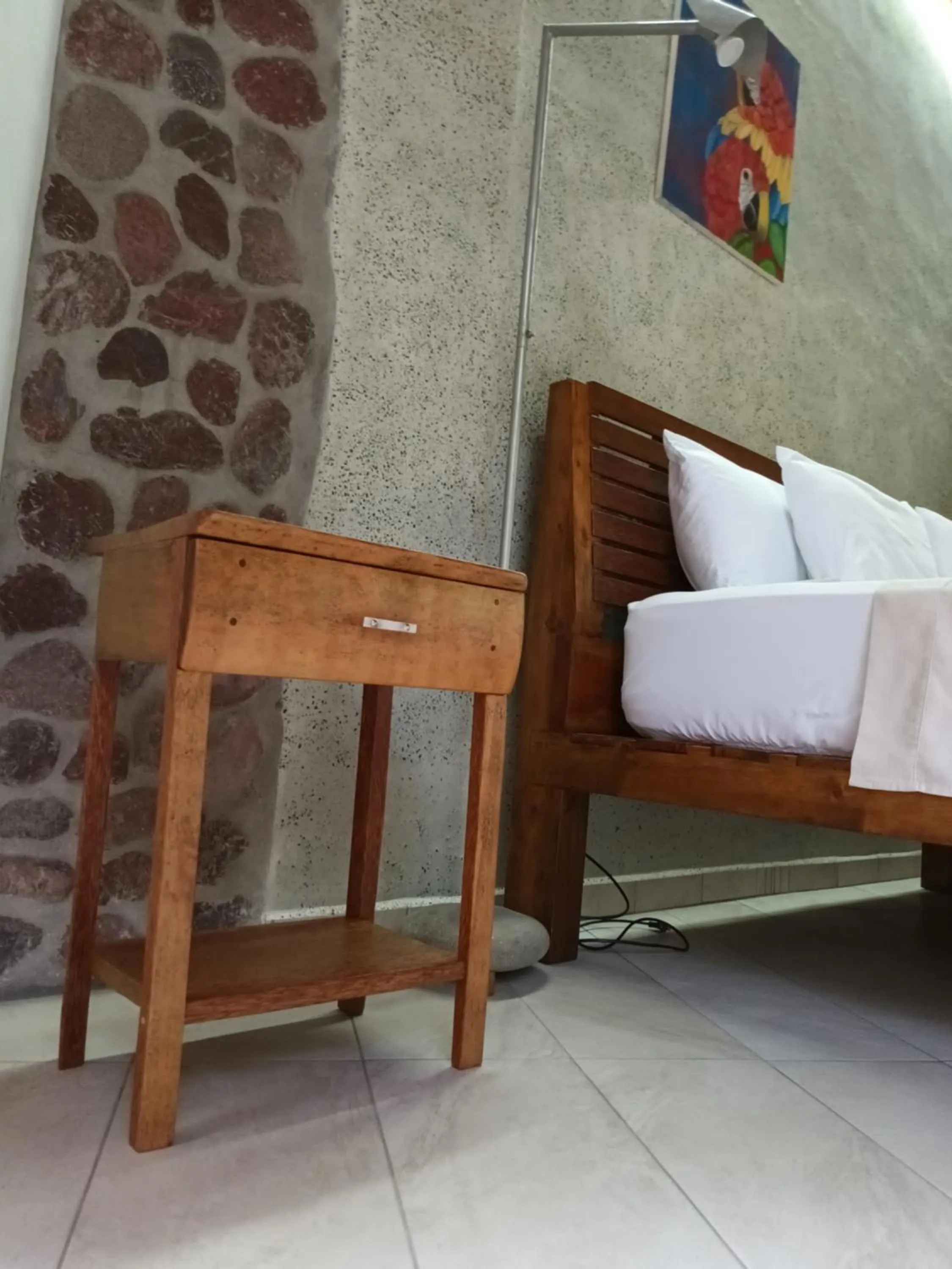 Bed in Omega Tours Eco-Jungle Lodge