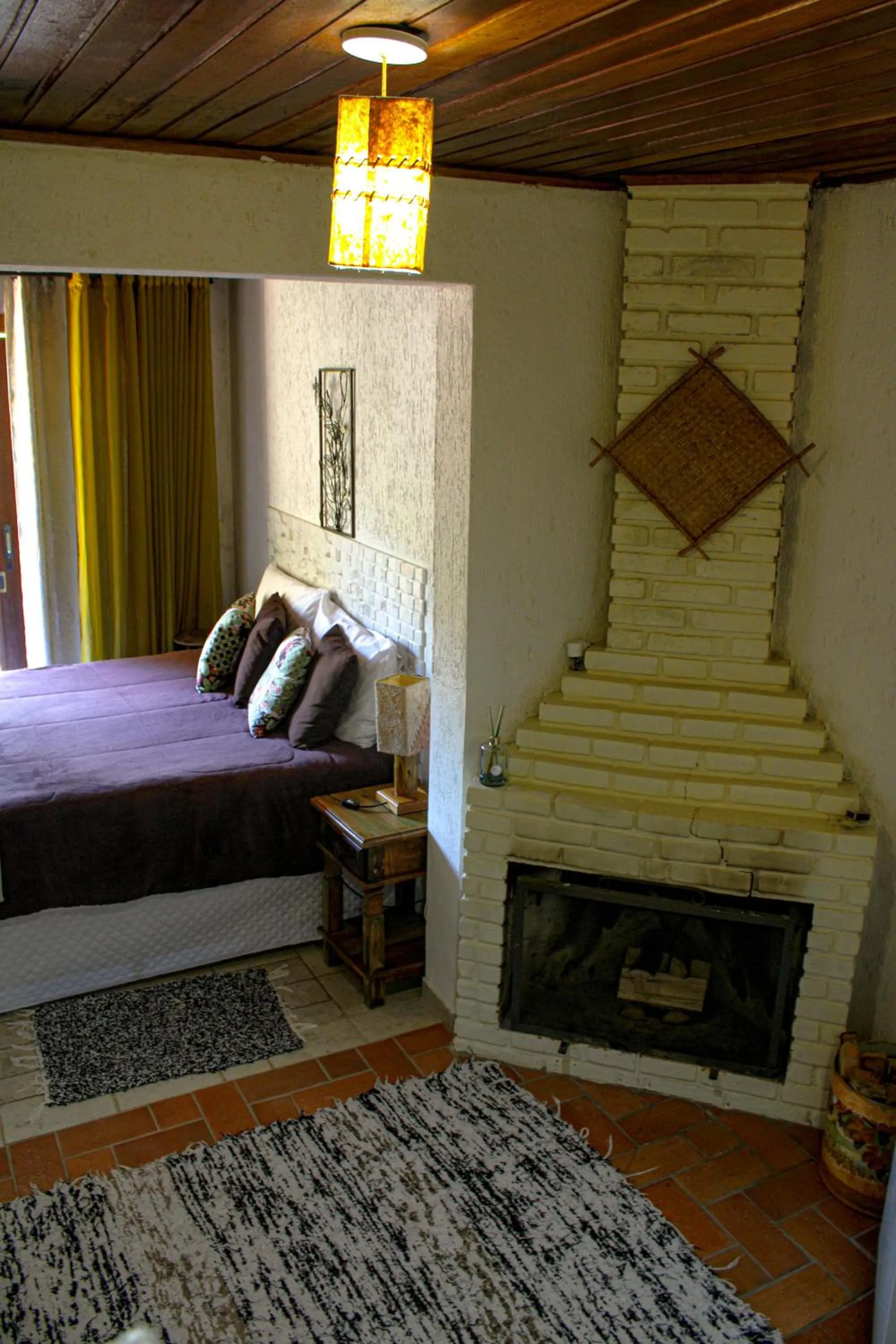 fireplace, Bed in Pousada Vinhas do Pinhal