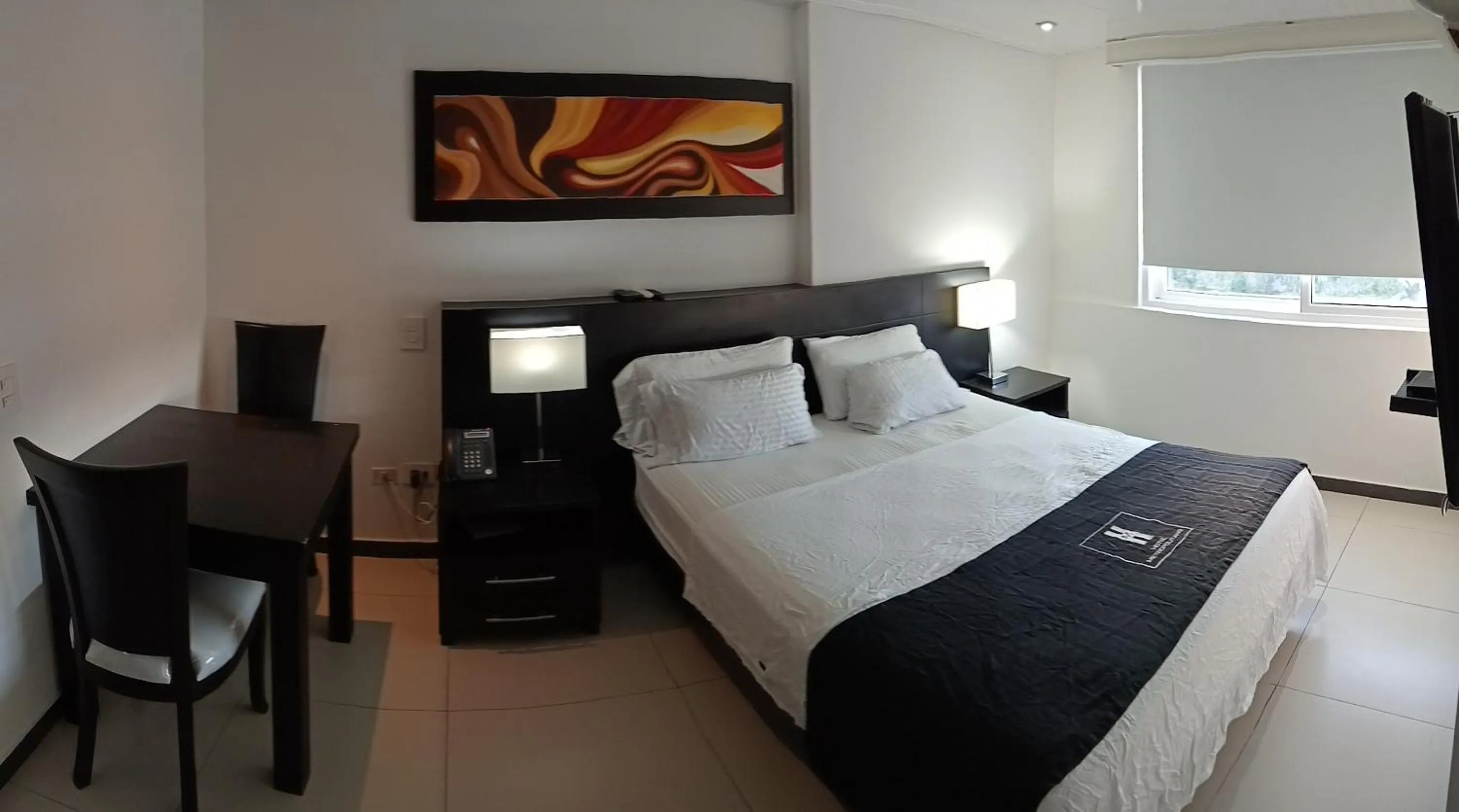 Bed in Hotel Metropolitano