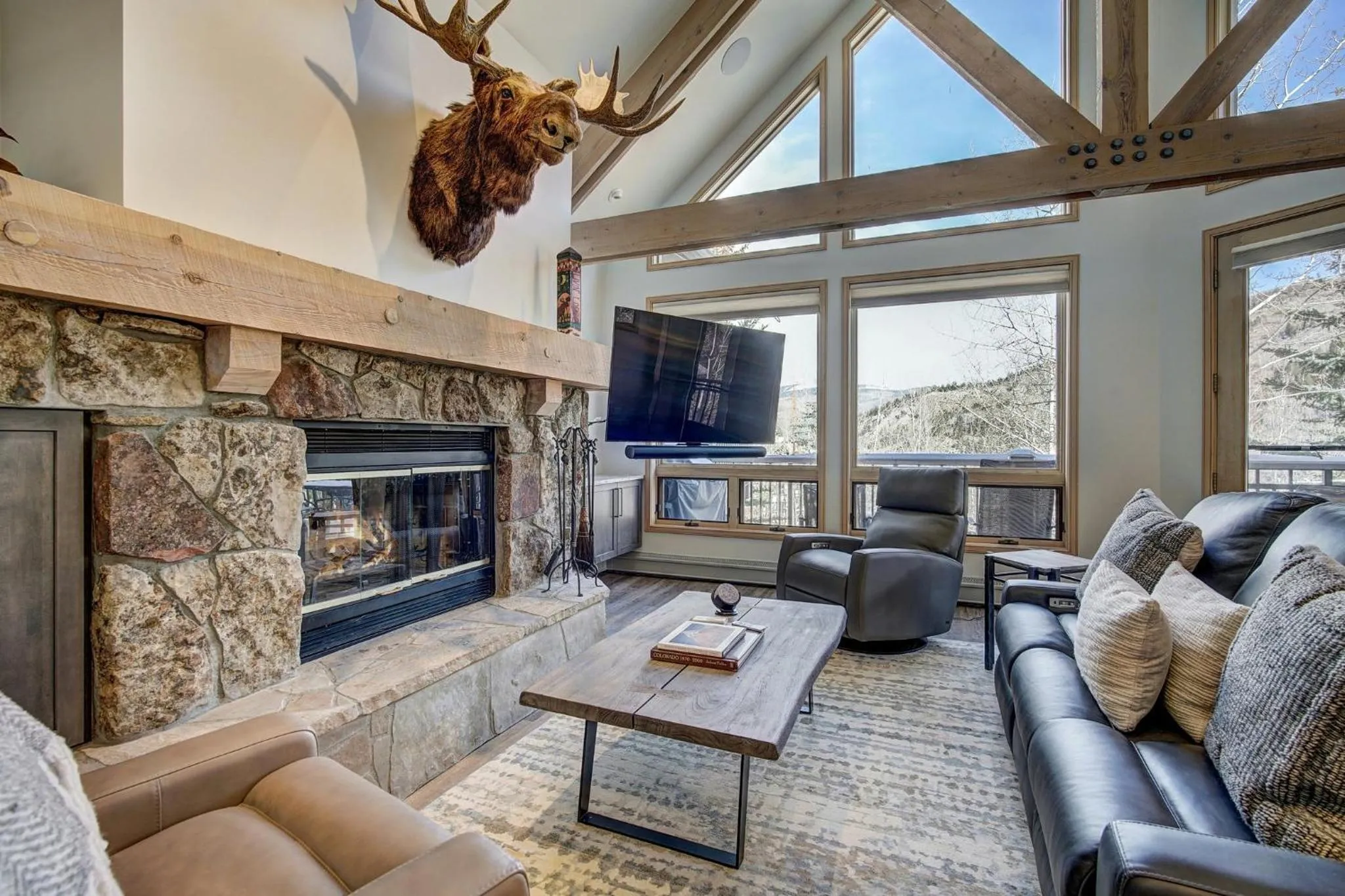 Living room in The Pines Lodge, a RockResort, by Vail Resorts